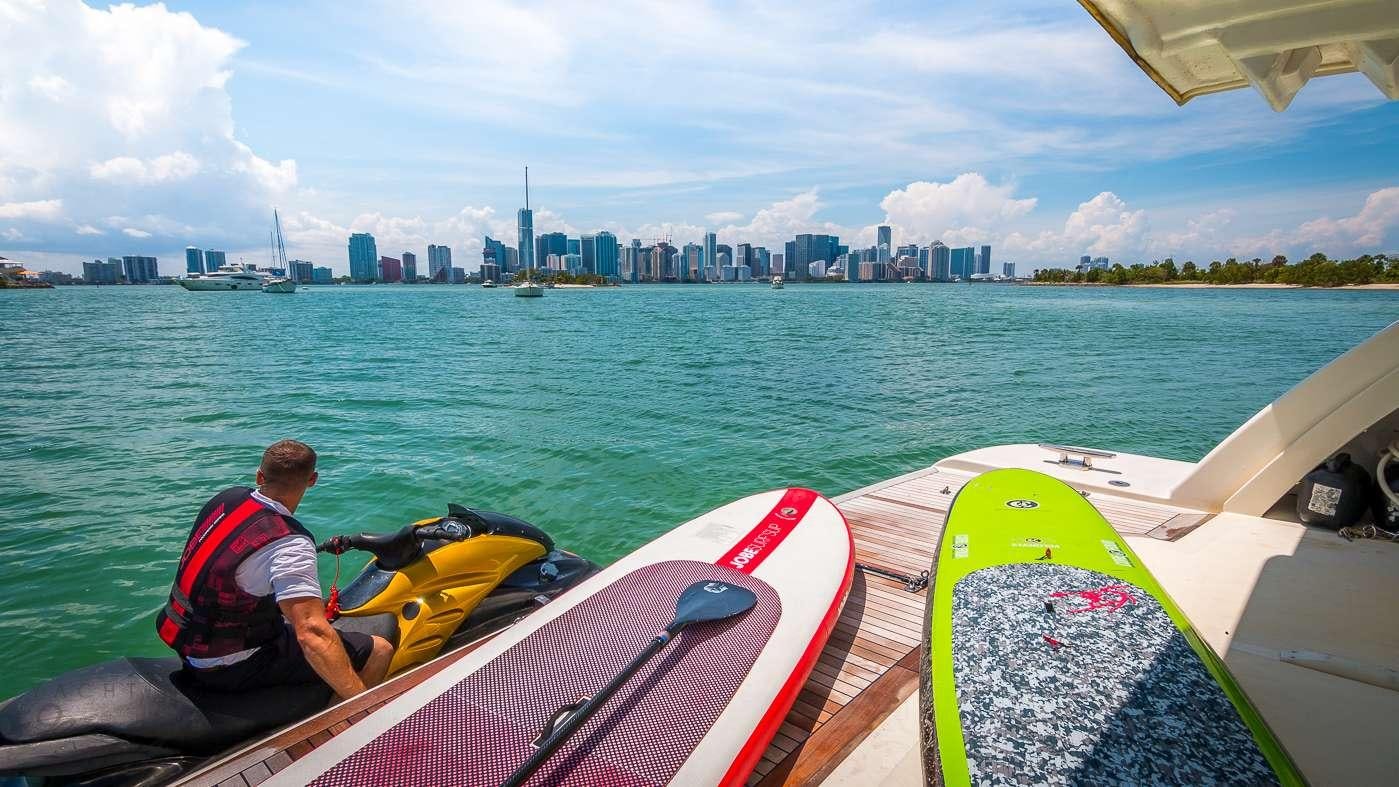 a person sitting in a boat aboard VENTURE Yacht for Charter