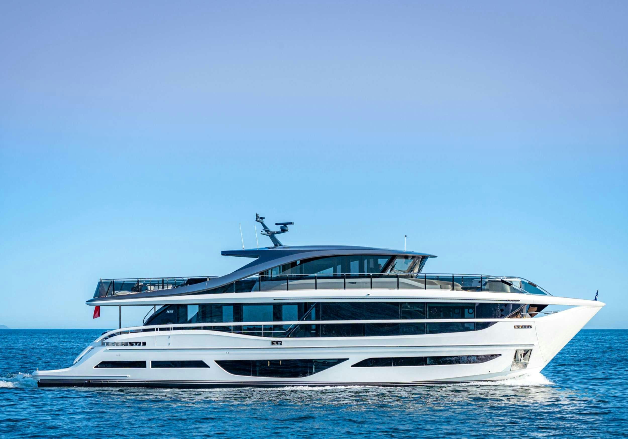 a white yacht in the water aboard MONOPOLY Yacht for Charter