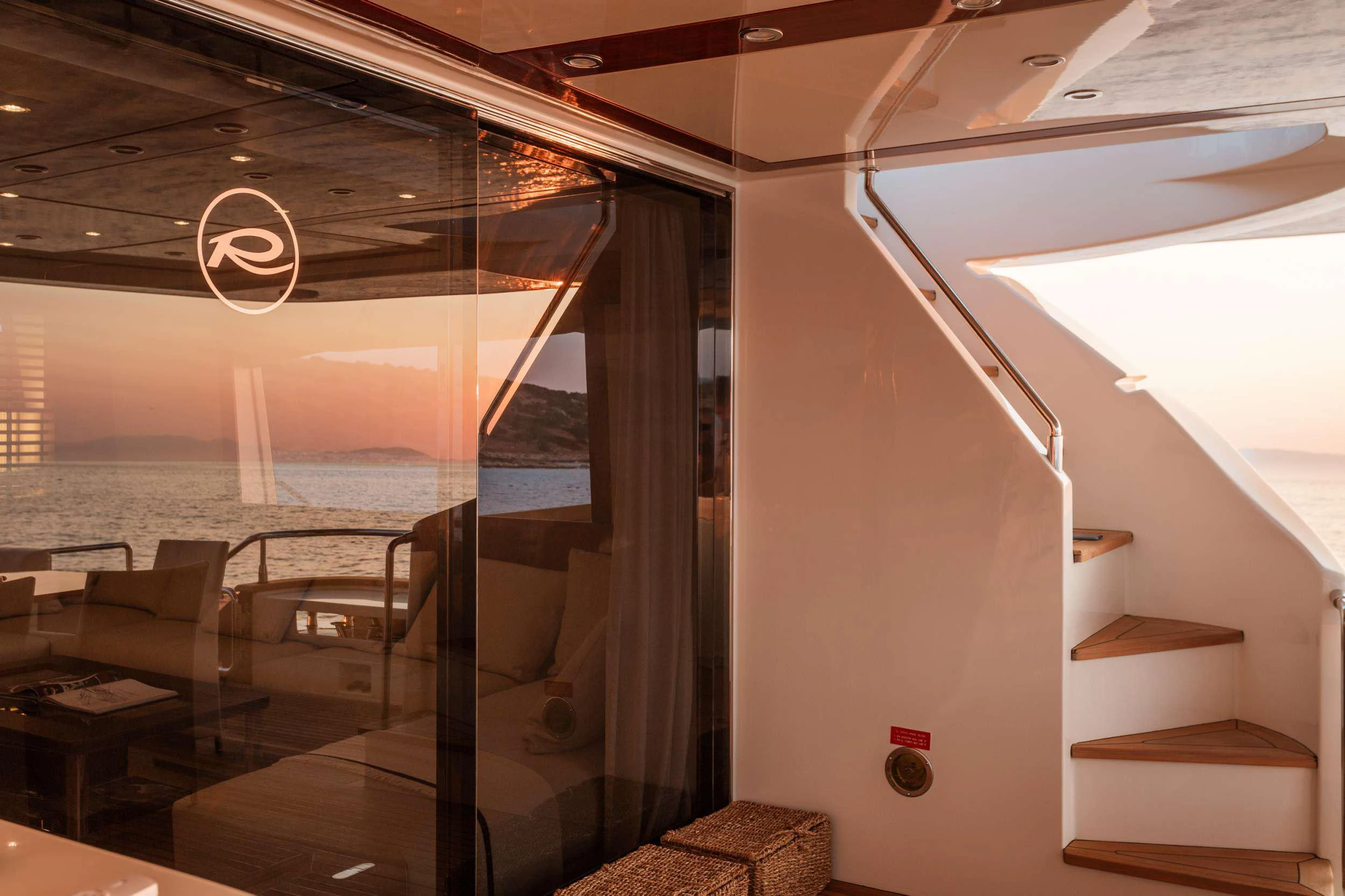 a room with a staircase and a window aboard ANLIA Yacht for Charter
