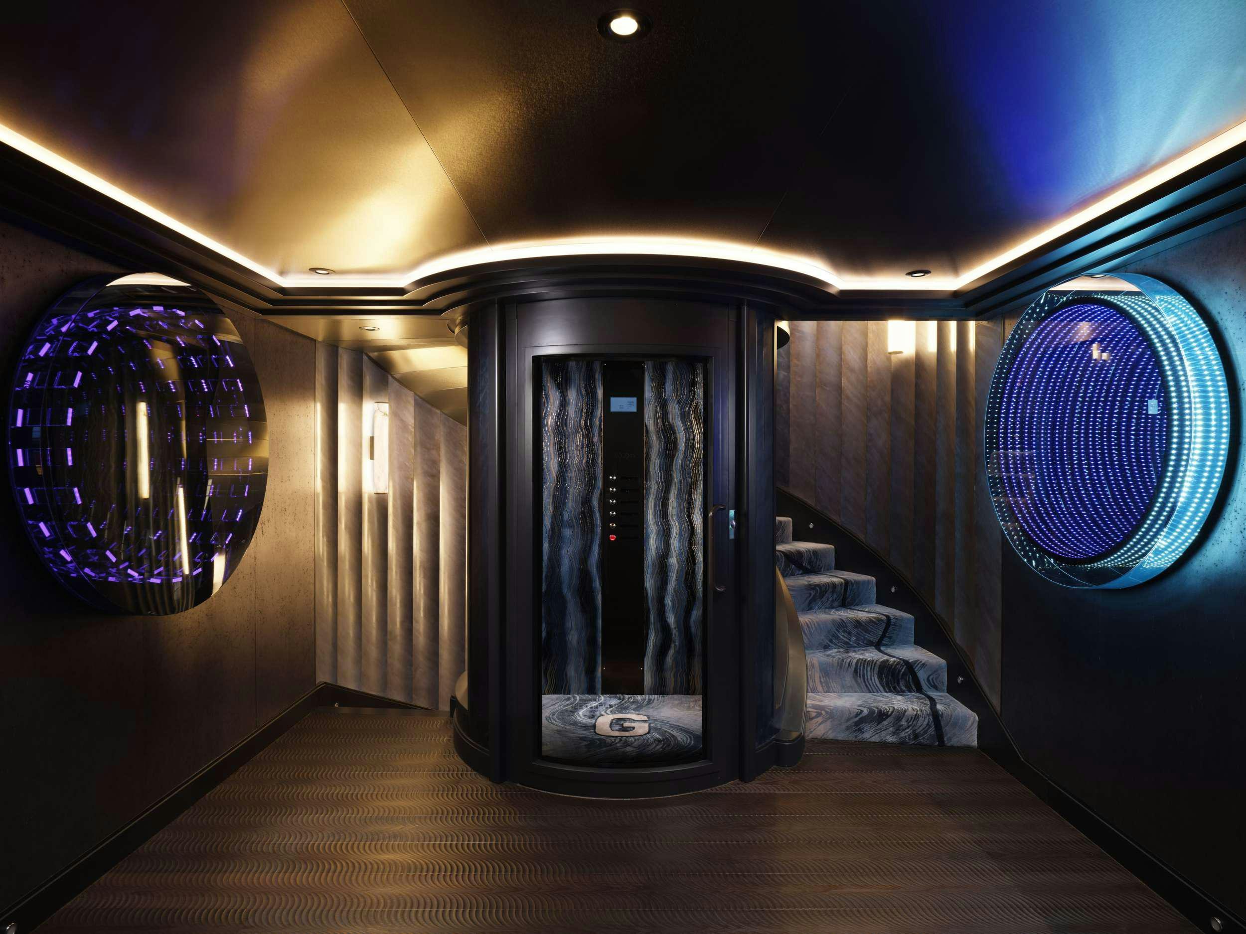 a large room with a large mirror aboard GALAXY Yacht for Charter
