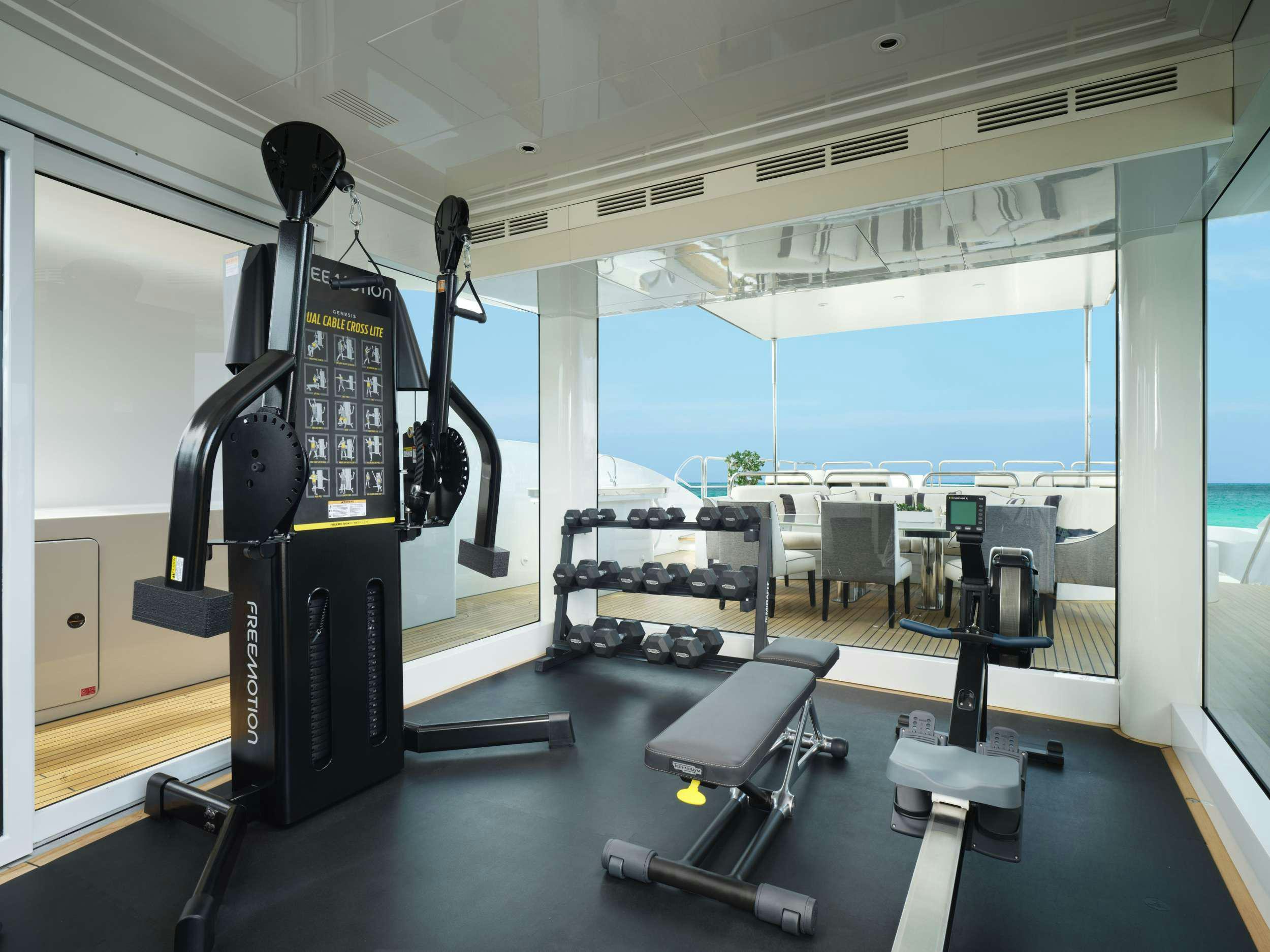 a machine in a room aboard GALAXY Yacht for Charter