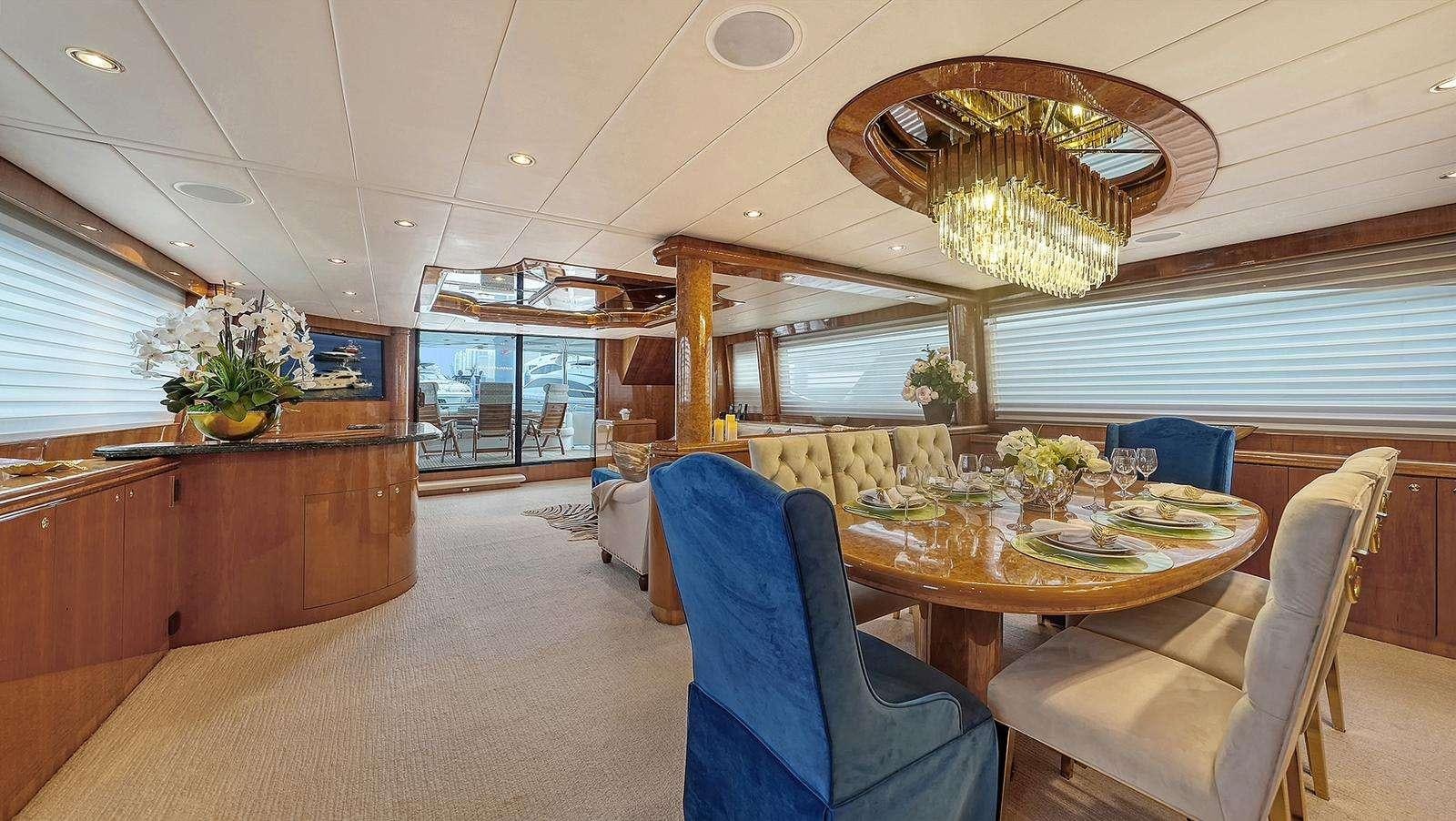 a large dining room with a large open floor plan aboard FANTASEA Yacht for Charter