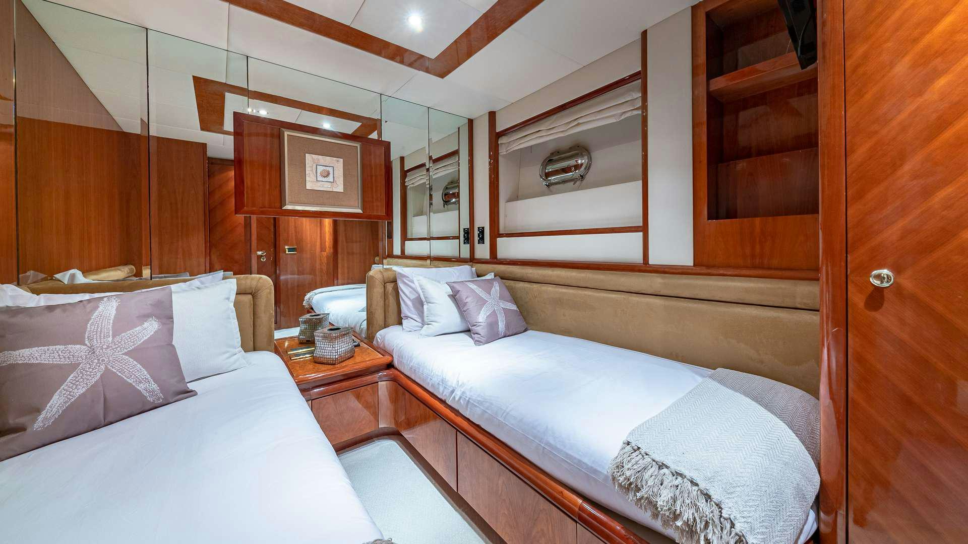 a room with two beds aboard SALT SHAKER Yacht for Charter