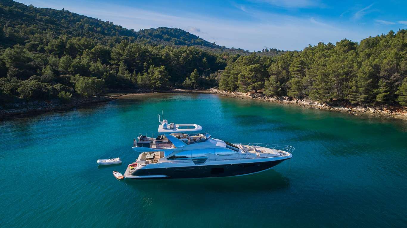 a couple of boats in the water aboard AZIMUT 72 - RELAX OF Yacht for Charter