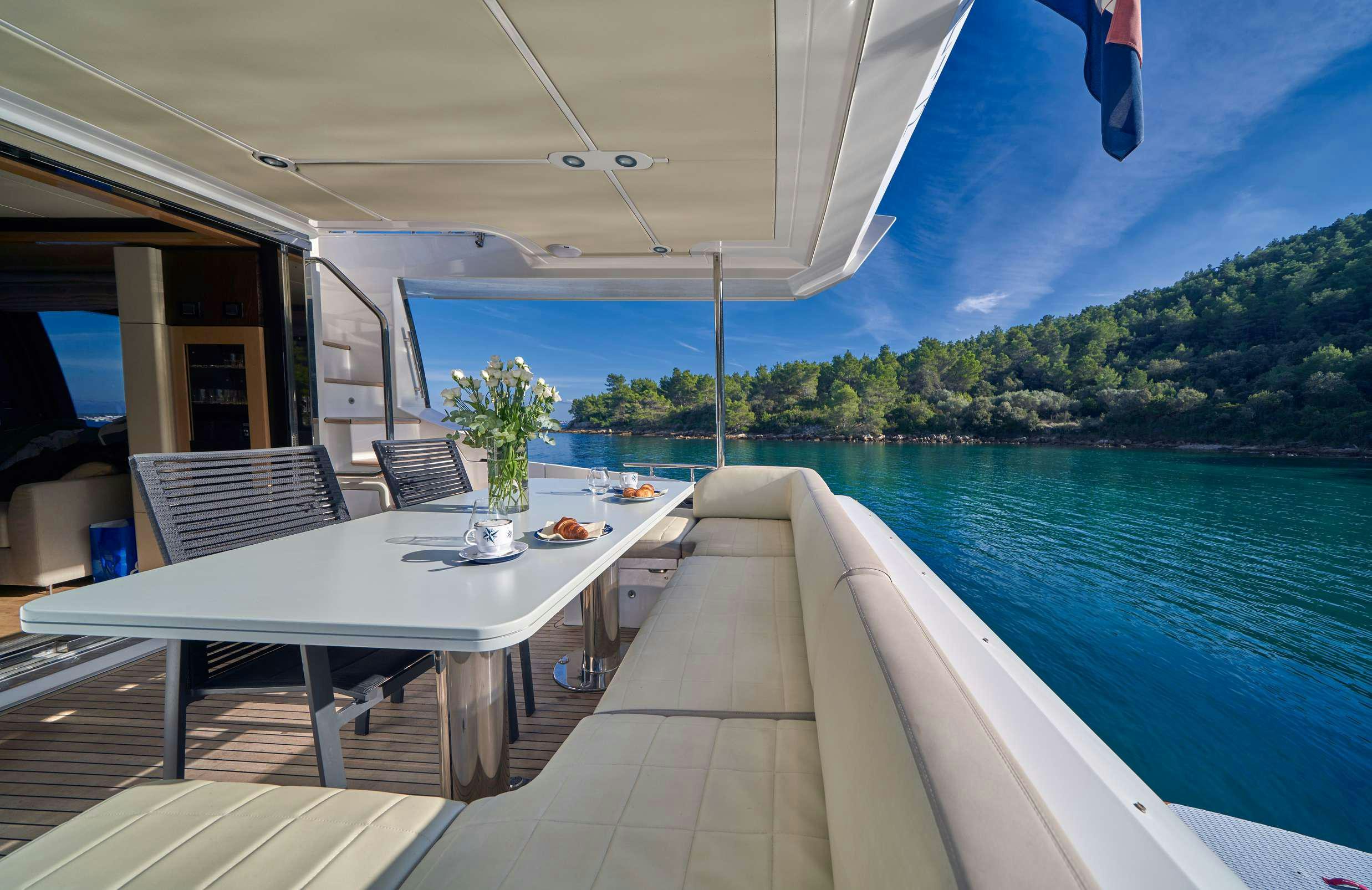 a table on a boat aboard AZIMUT 72 - RELAX OF Yacht for Charter
