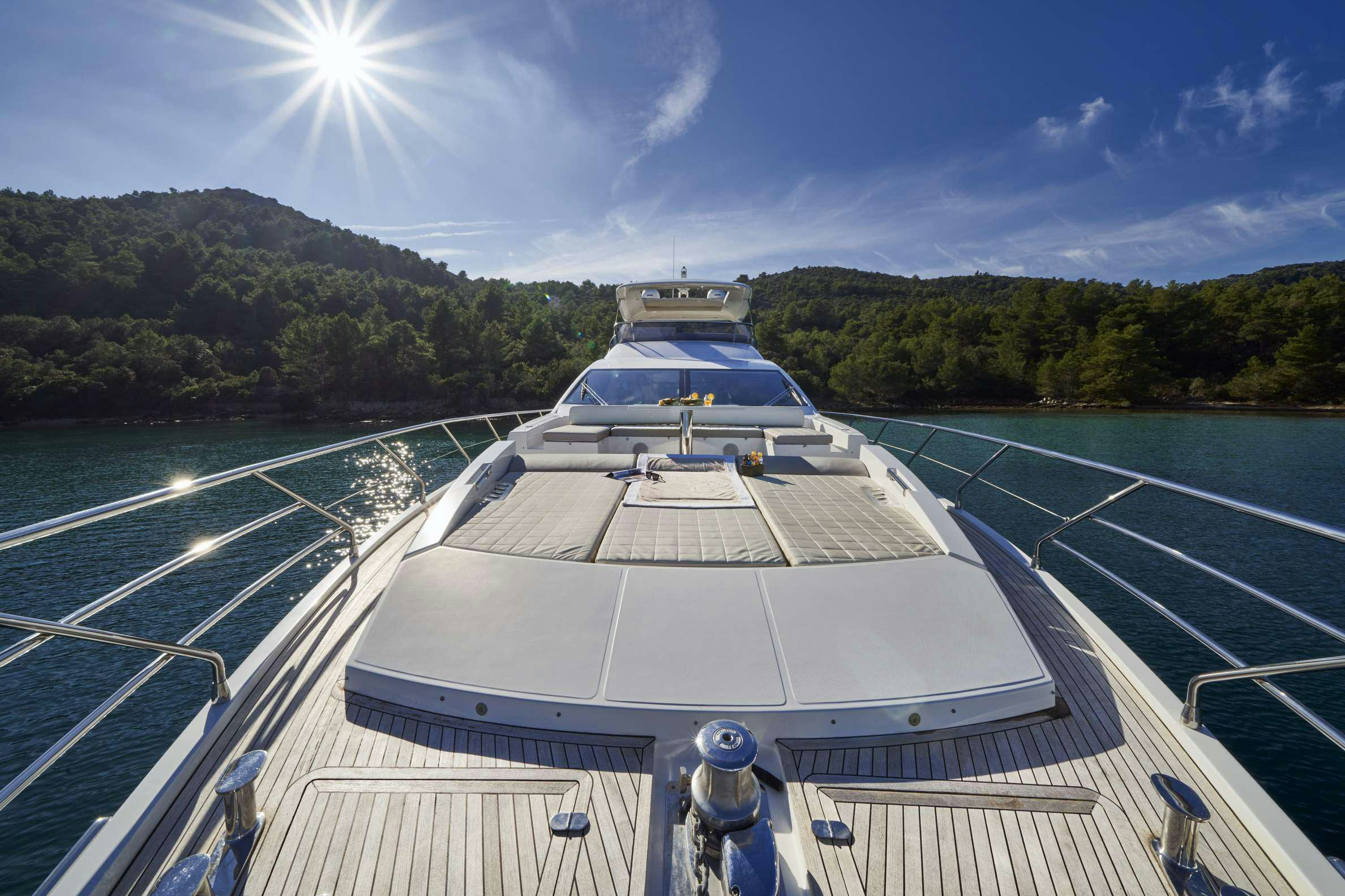 a large white building with a dome and a road with trees and blue sky aboard AZIMUT 72 - RELAX OF Yacht for Charter