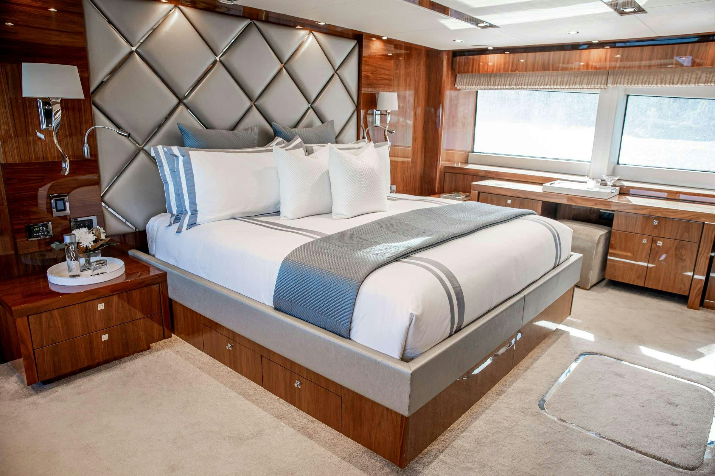 a bed in a room aboard RASCAL Yacht for Charter