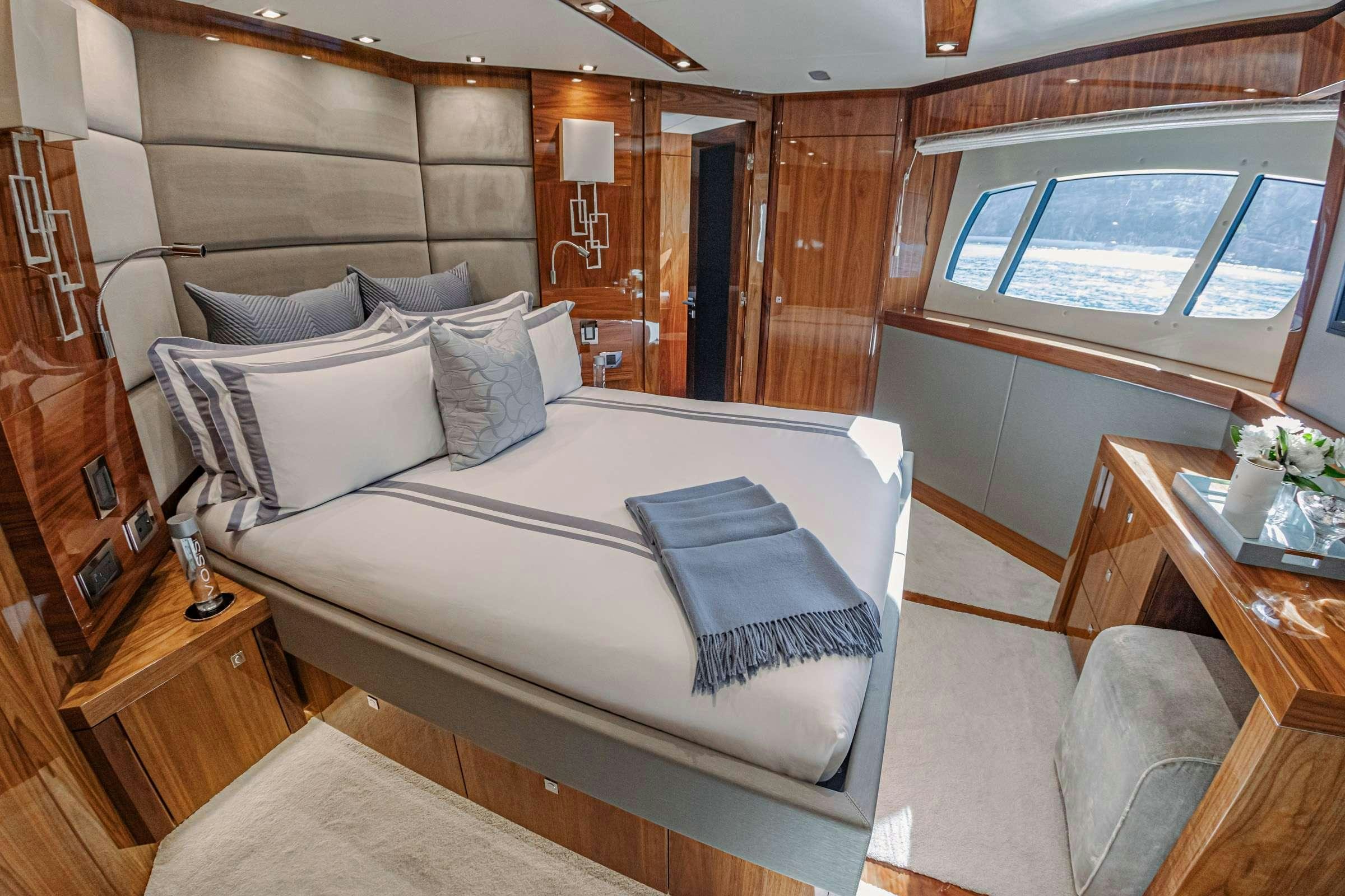 a bed in a cabin aboard RASCAL Yacht for Charter