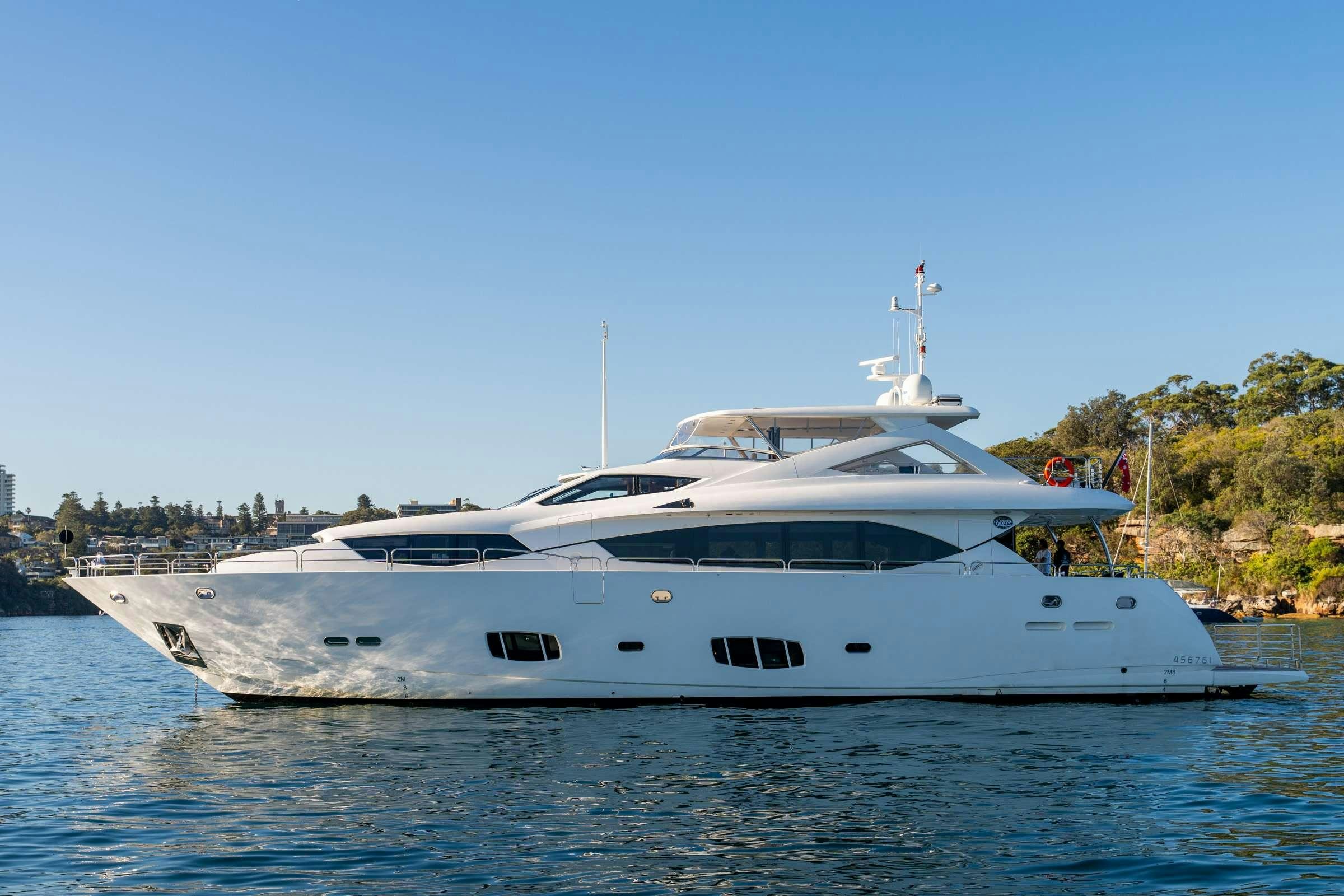 a white yacht on the water aboard CHAOS Yacht for Charter