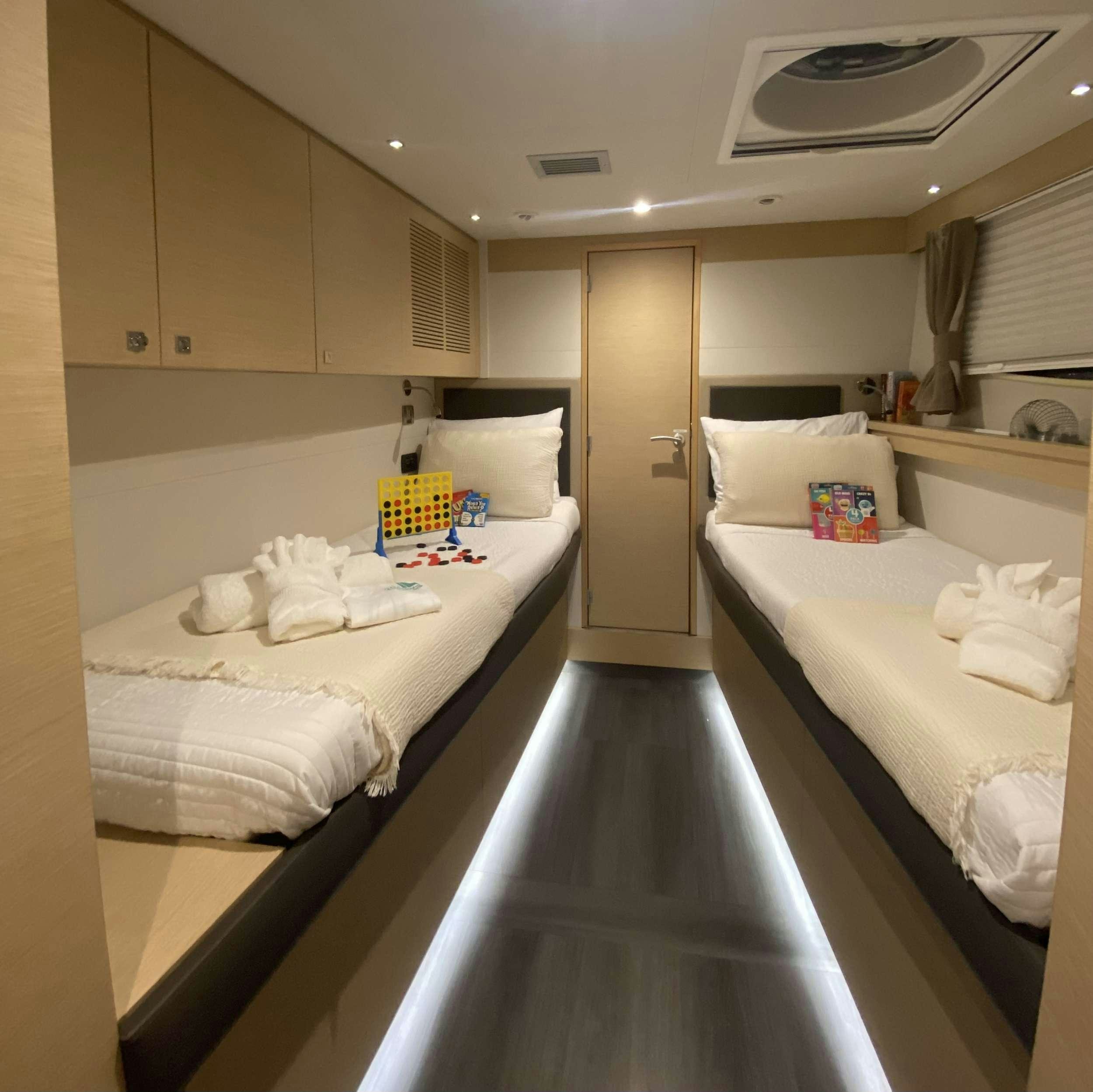 a bathroom with a bed aboard SOME KIND OF WONDERFUL Yacht for Charter