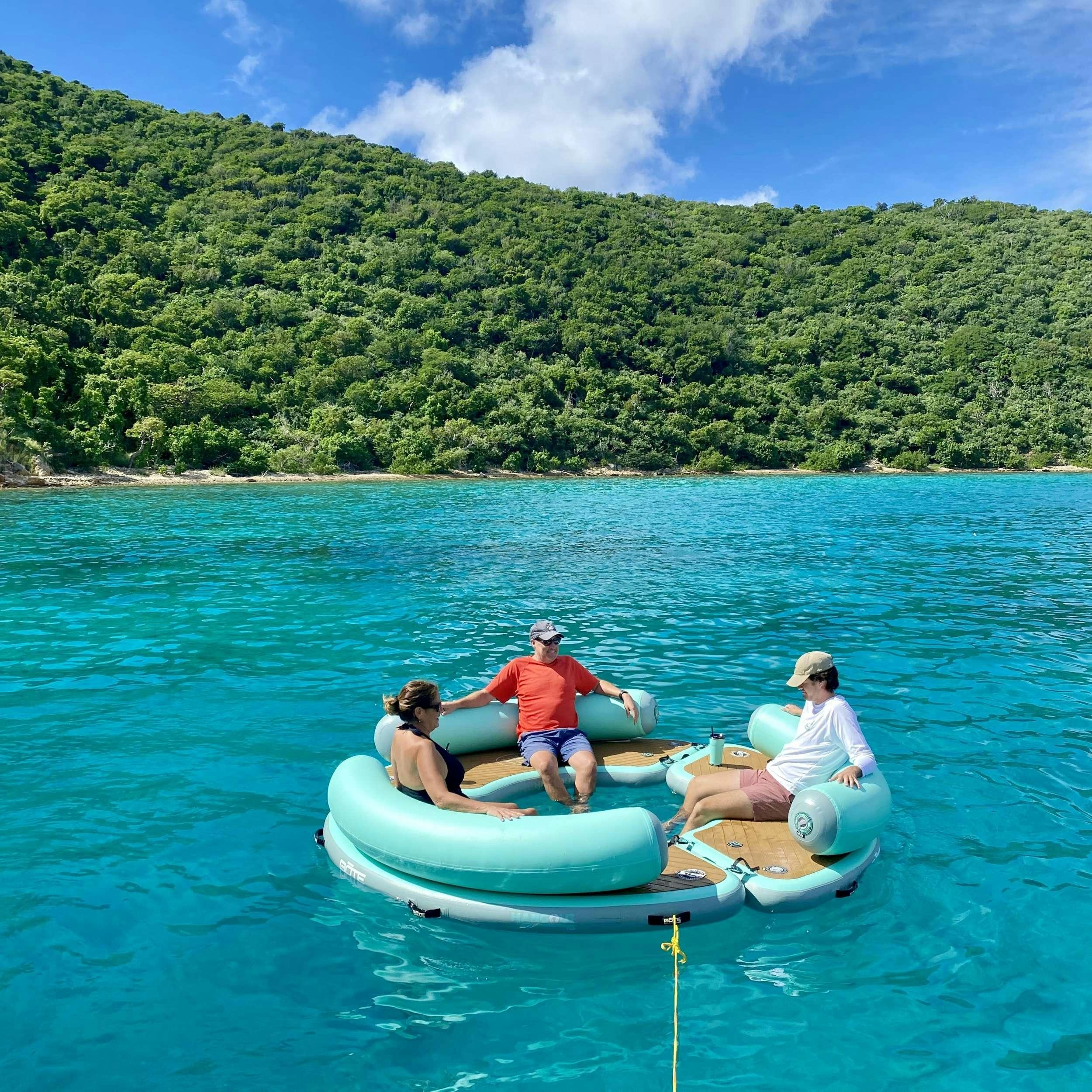 a group of people in a canoe aboard SOME KIND OF WONDERFUL Yacht for Charter