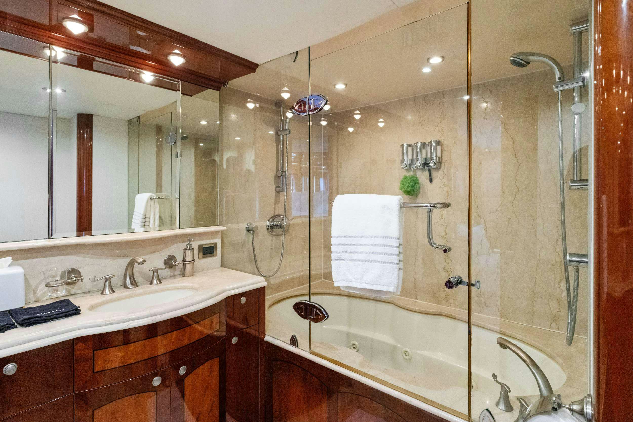 a bathroom with a large shower aboard CORAGGIO Yacht for Charter