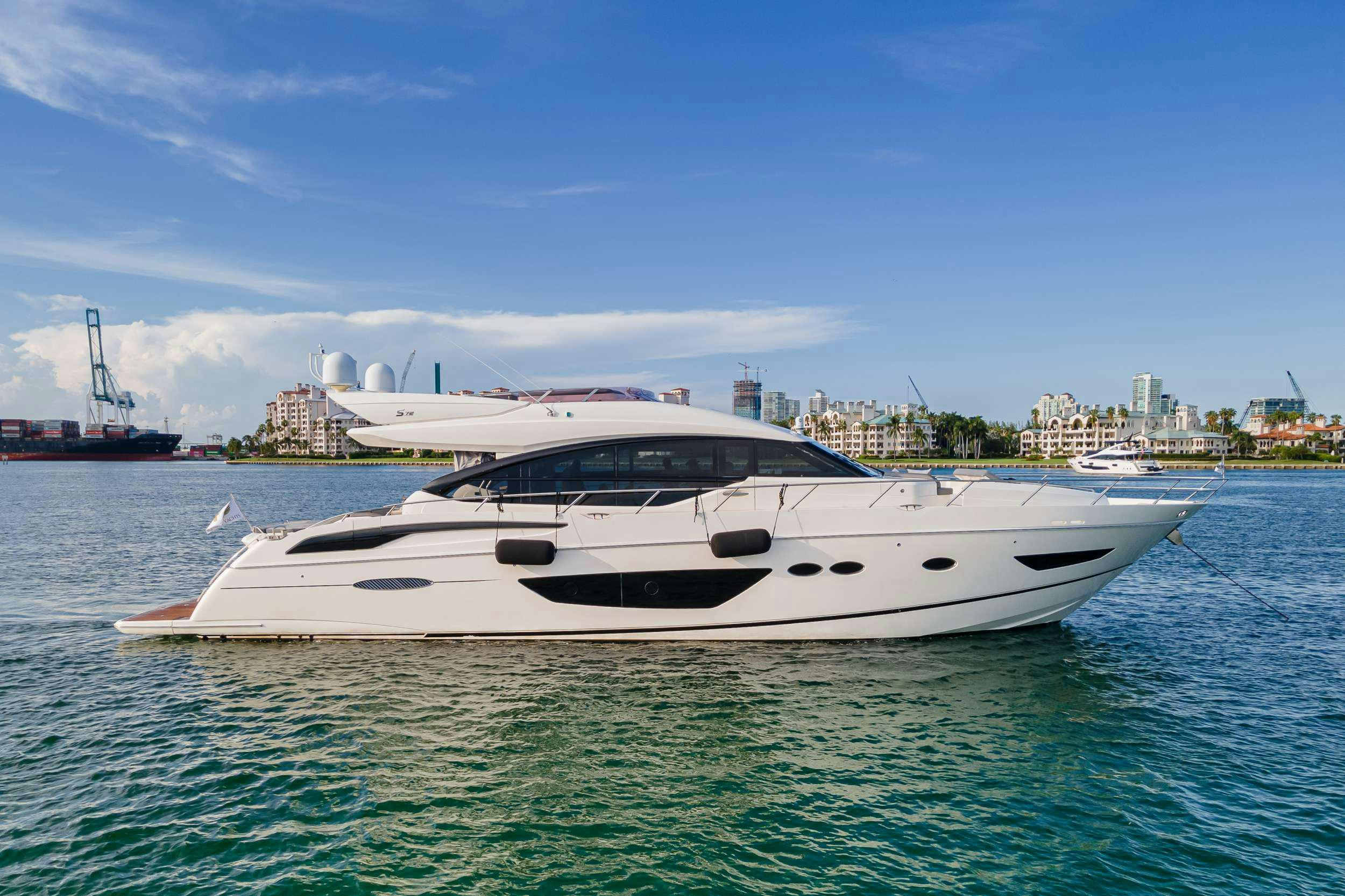 a white yacht in the water aboard SNOWBIRD Yacht for Charter
