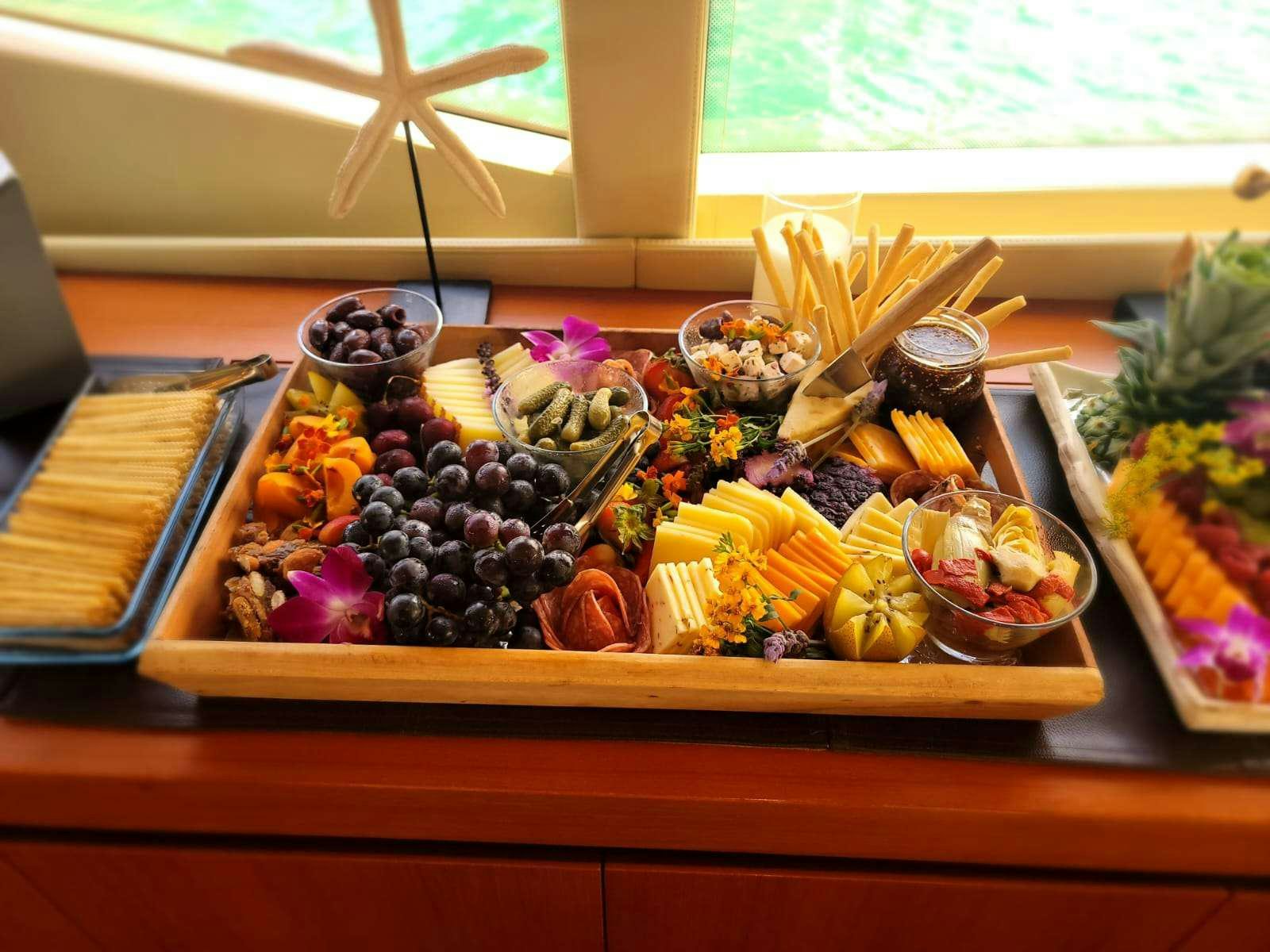 a table with food on it aboard SNOWBIRD Yacht for Charter