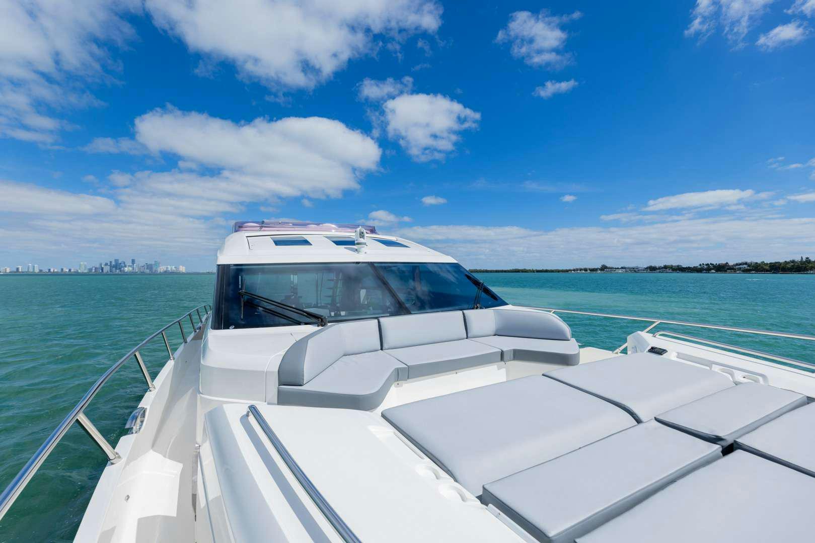 a white car on a boat aboard SNOWBIRD Yacht for Charter