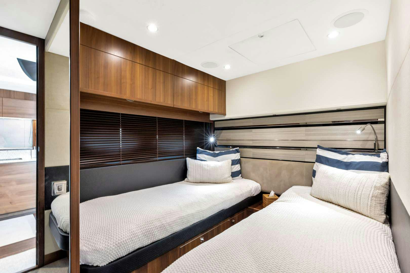a room with two beds aboard SNOWBIRD Yacht for Charter
