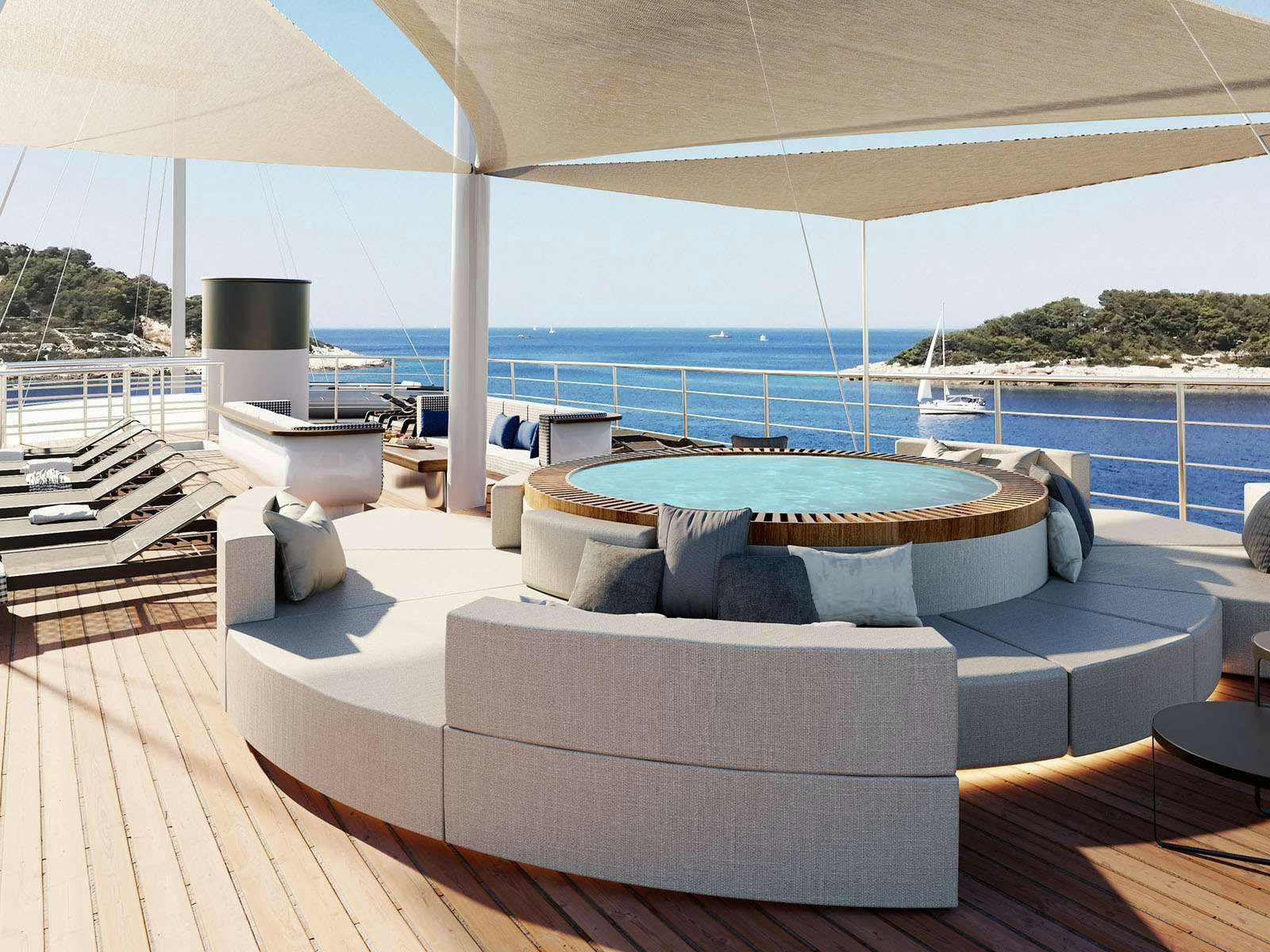 a large lounge area with a large pool and a large deck aboard BELLEZZA Yacht for Charter