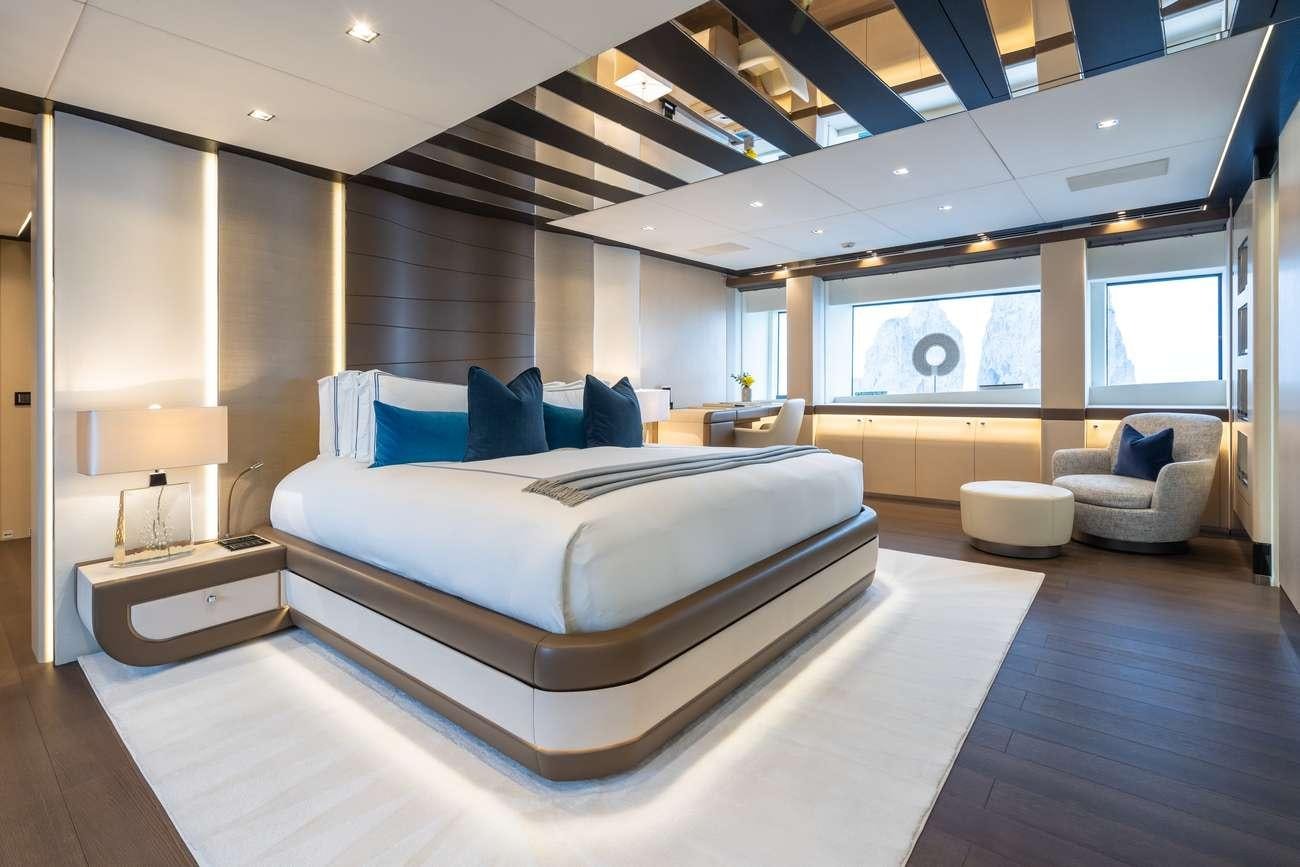 a large bedroom with a large bed aboard HALARA Yacht for Charter