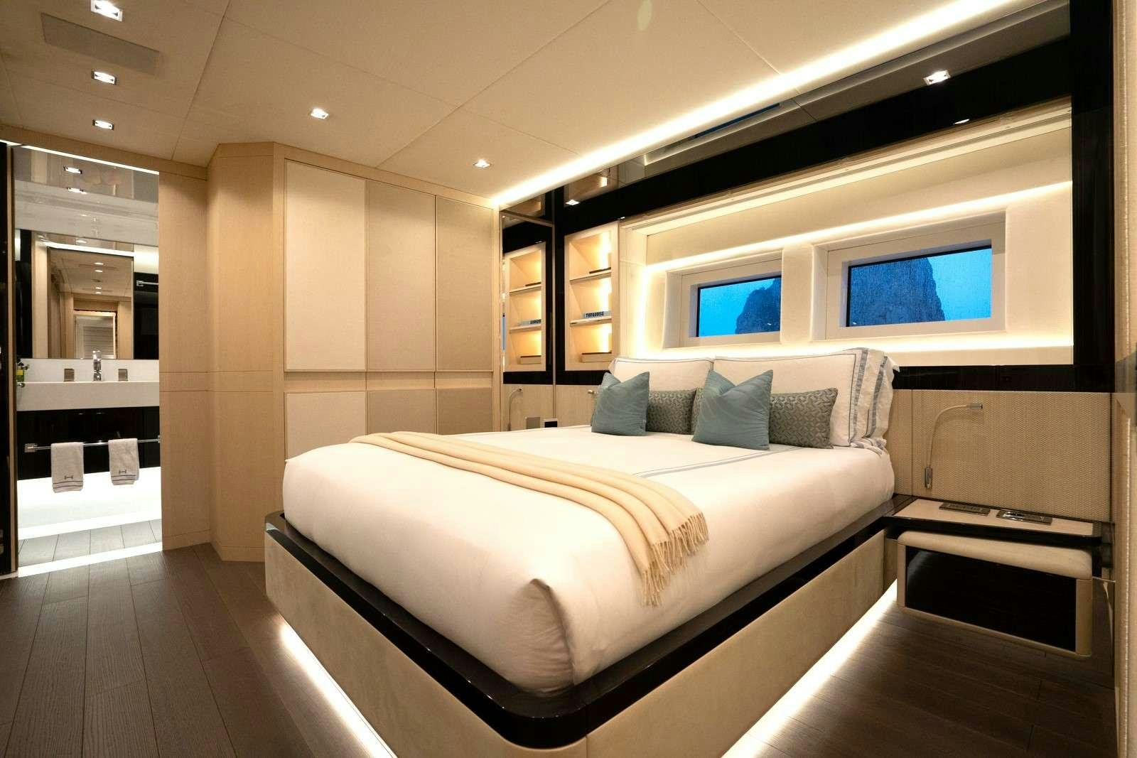 a bed in a room aboard HALARA Yacht for Charter