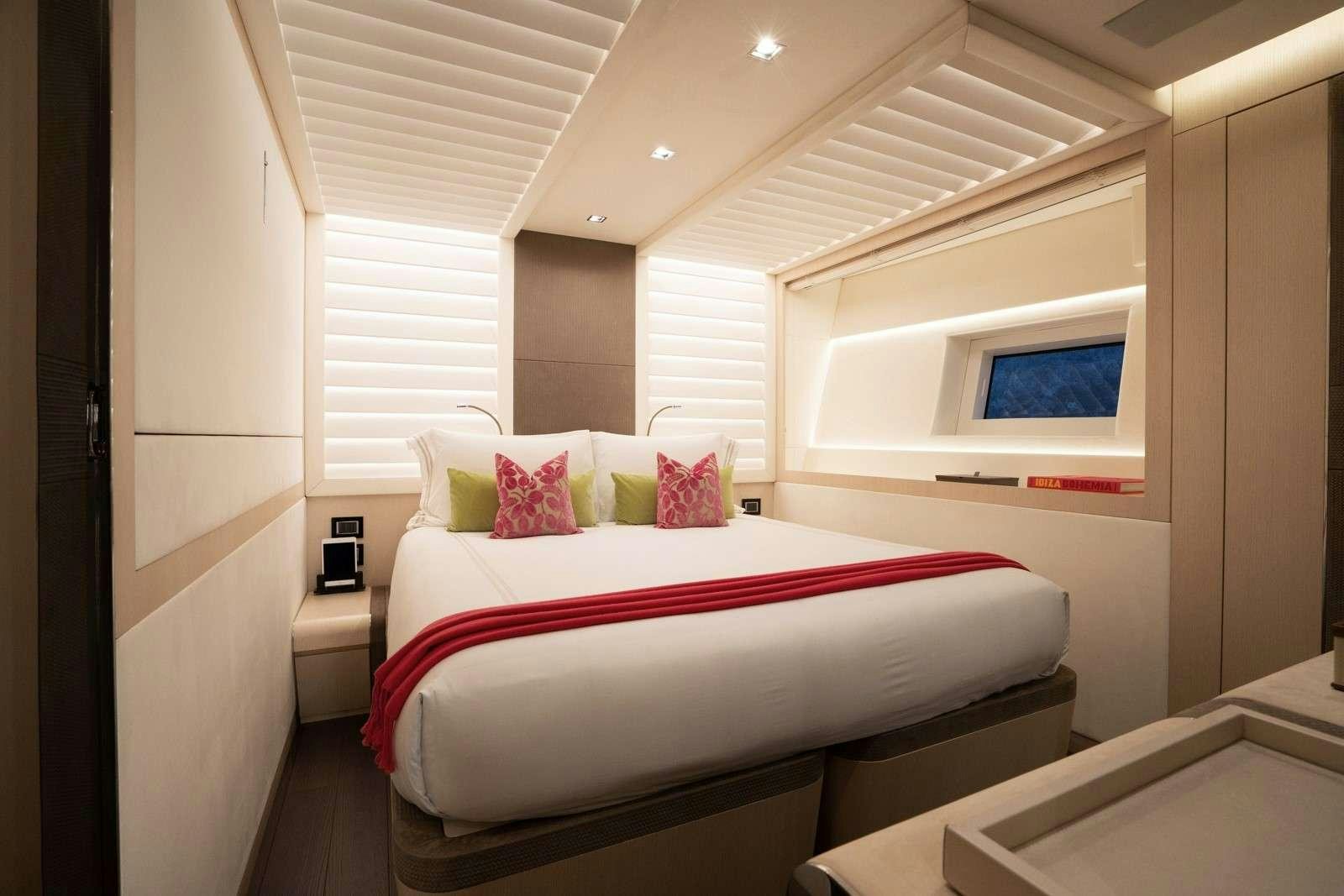 a bed in a room aboard HALARA Yacht for Charter