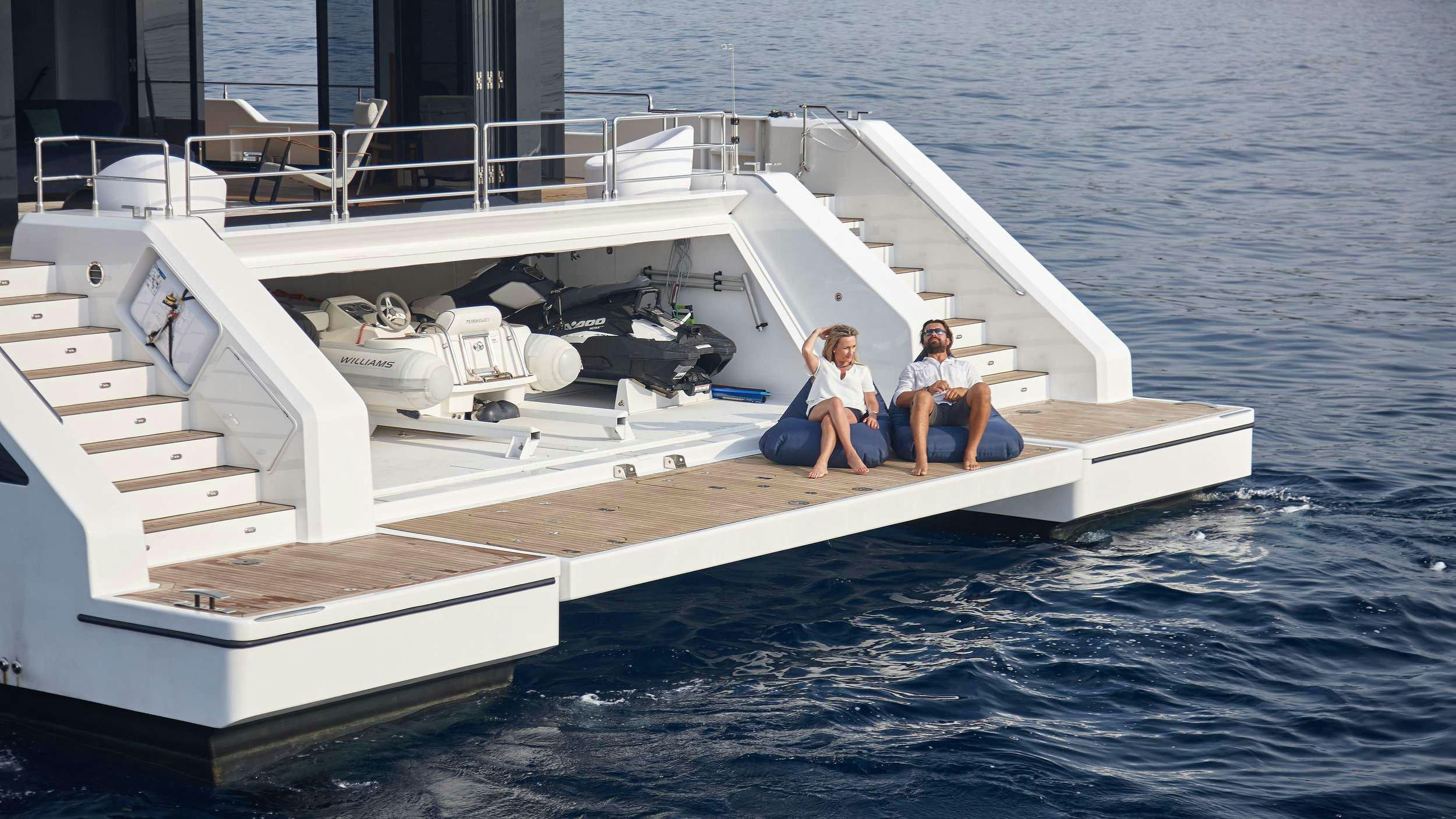 a couple sitting on a boat aboard MIDORI Yacht for Charter