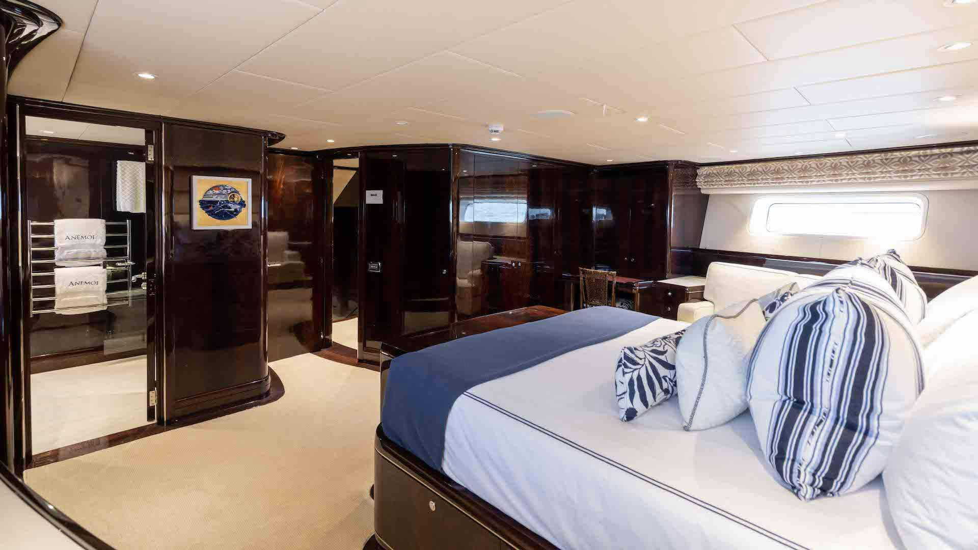 a bed in a room aboard ANEMOI Yacht for Charter