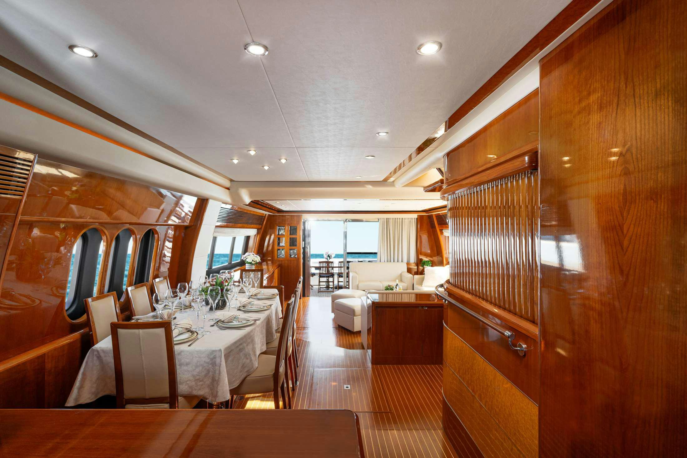 a dining room with a table aboard GEKTOR Yacht for Charter