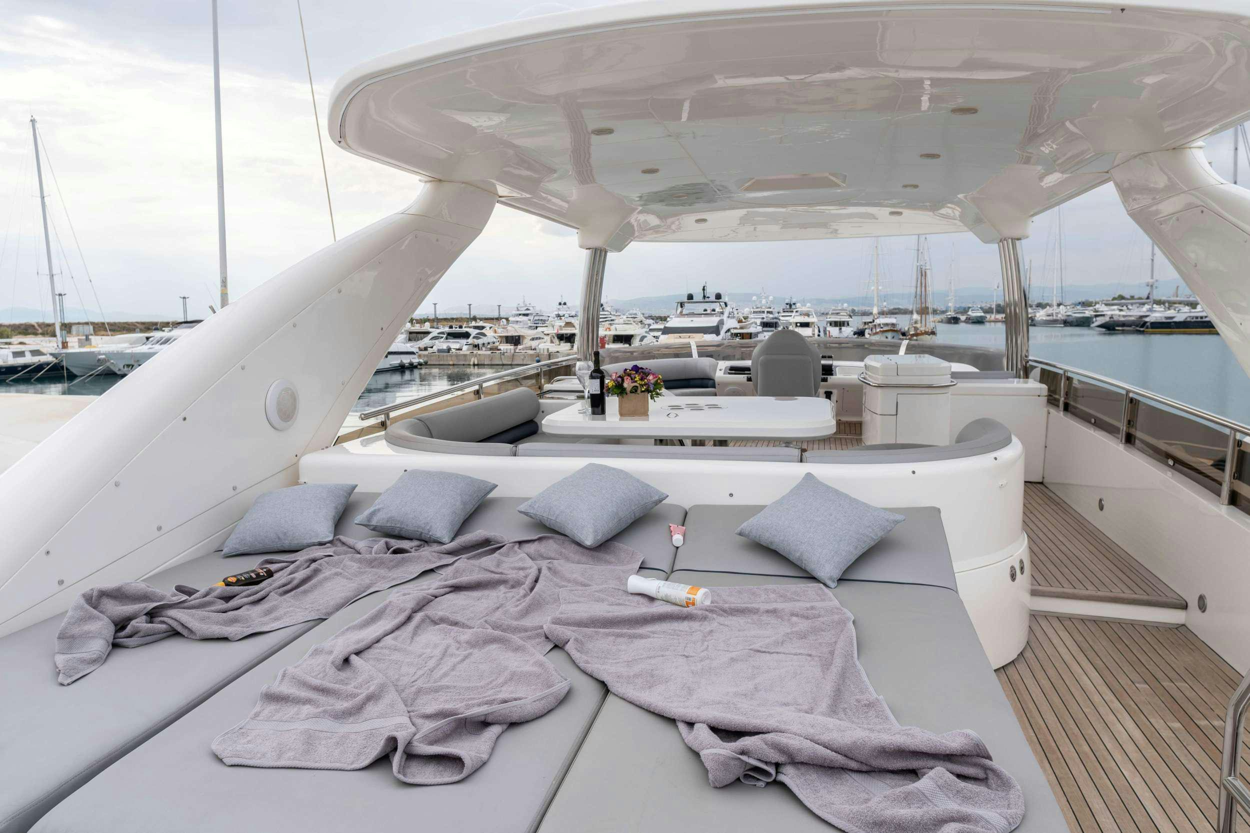 a room with a bed and a large white tent aboard GEKTOR Yacht for Charter