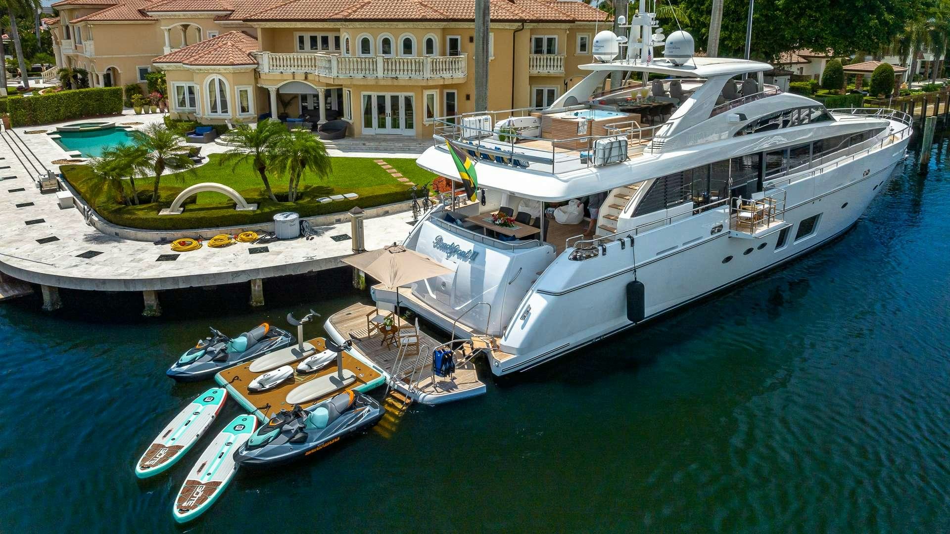boats docked at a pier aboard BEACHFRONT II Yacht for Charter