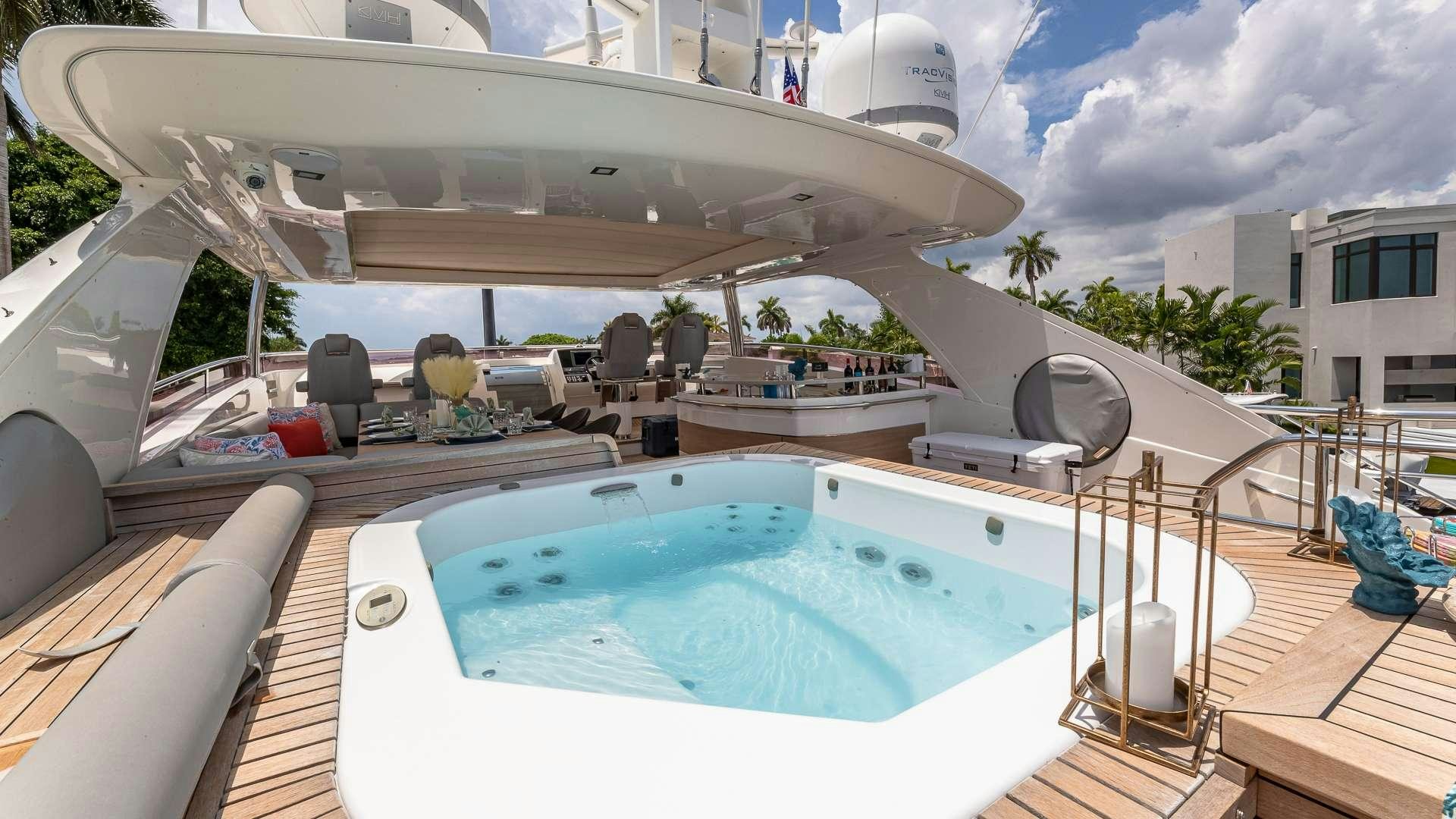 a pool with a large satellite dish aboard BEACHFRONT II Yacht for Charter