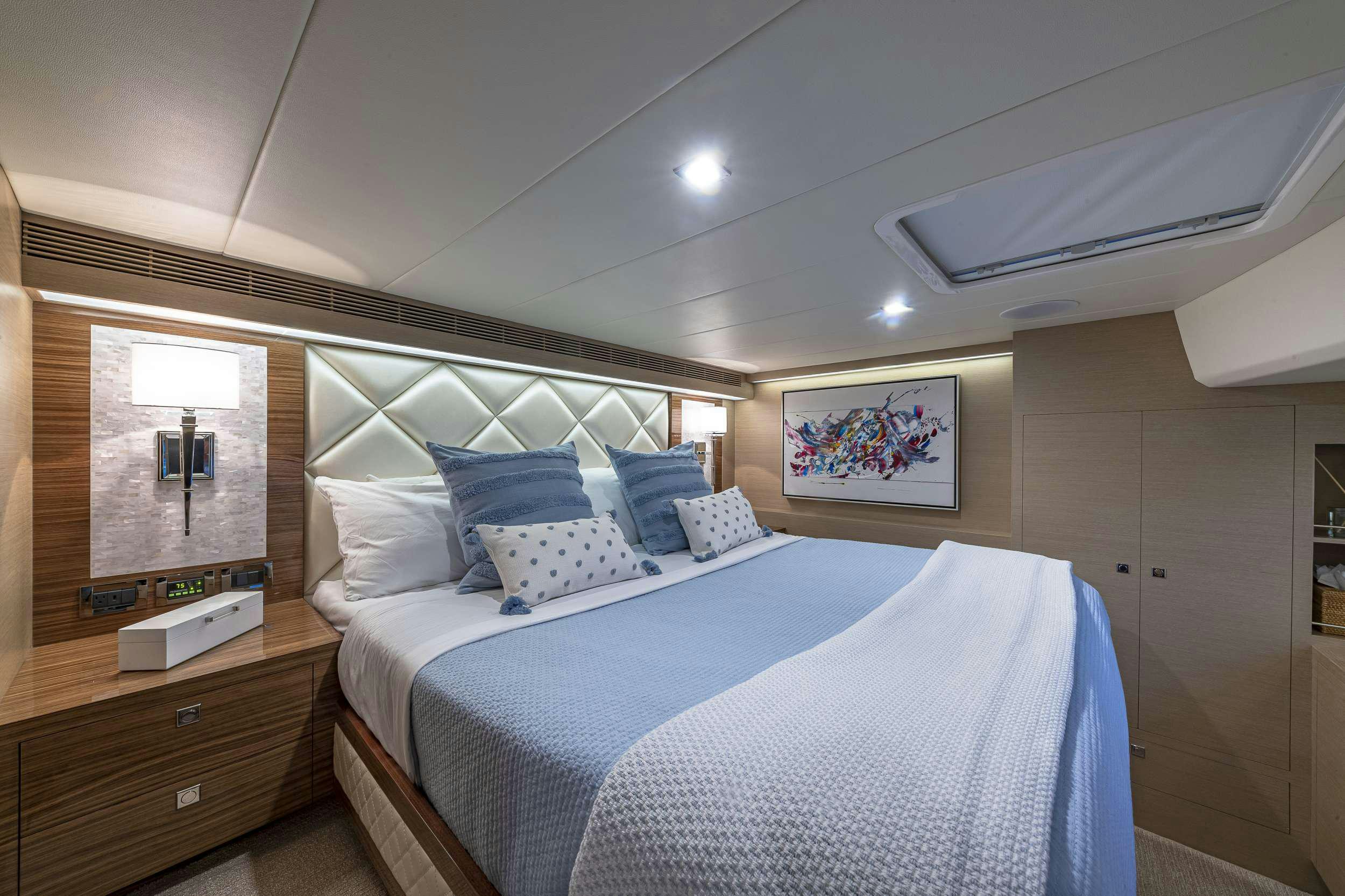 a room with two beds aboard OMAKASE Yacht for Charter