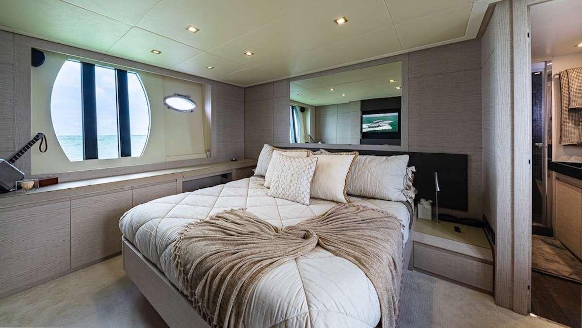 a bed in a room aboard LOKI Yacht for Charter