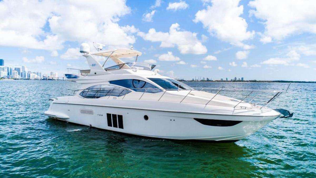 a white yacht in the water aboard BLUE SEA Yacht for Charter