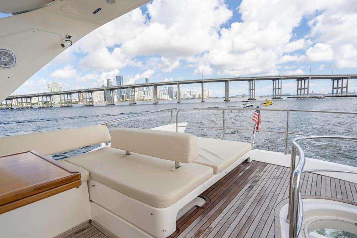 a person walking on a deck of a boat aboard BLUE SEA Yacht for Charter