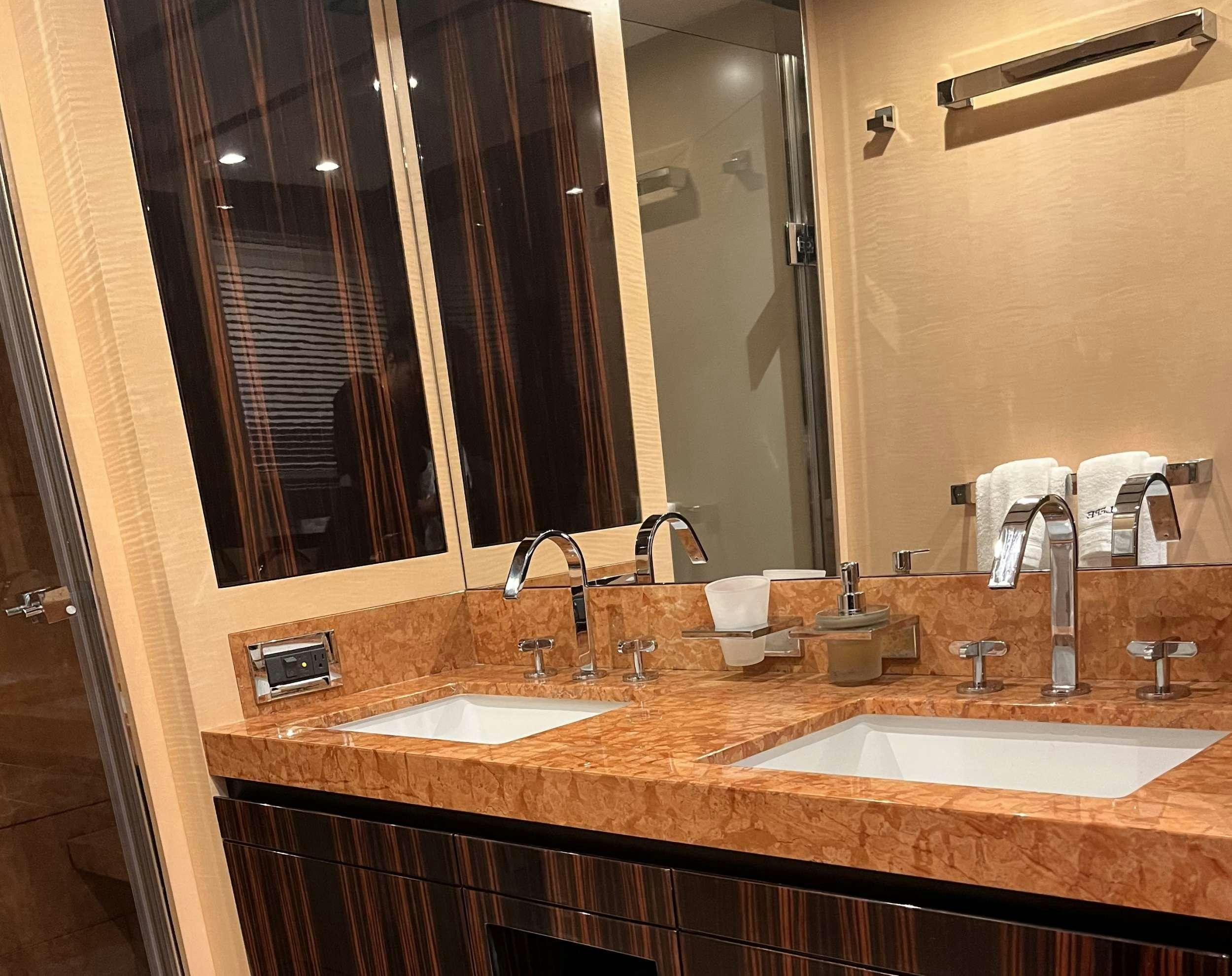 a bathroom with double sinks aboard 86  ITALIAN Yacht for Charter
