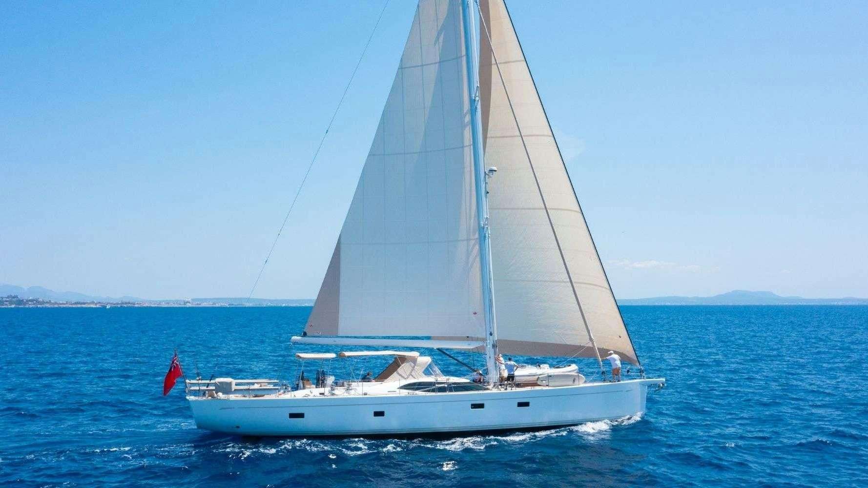 a sailboat in the water aboard CHAMPAGNE HIPPY Yacht for Charter