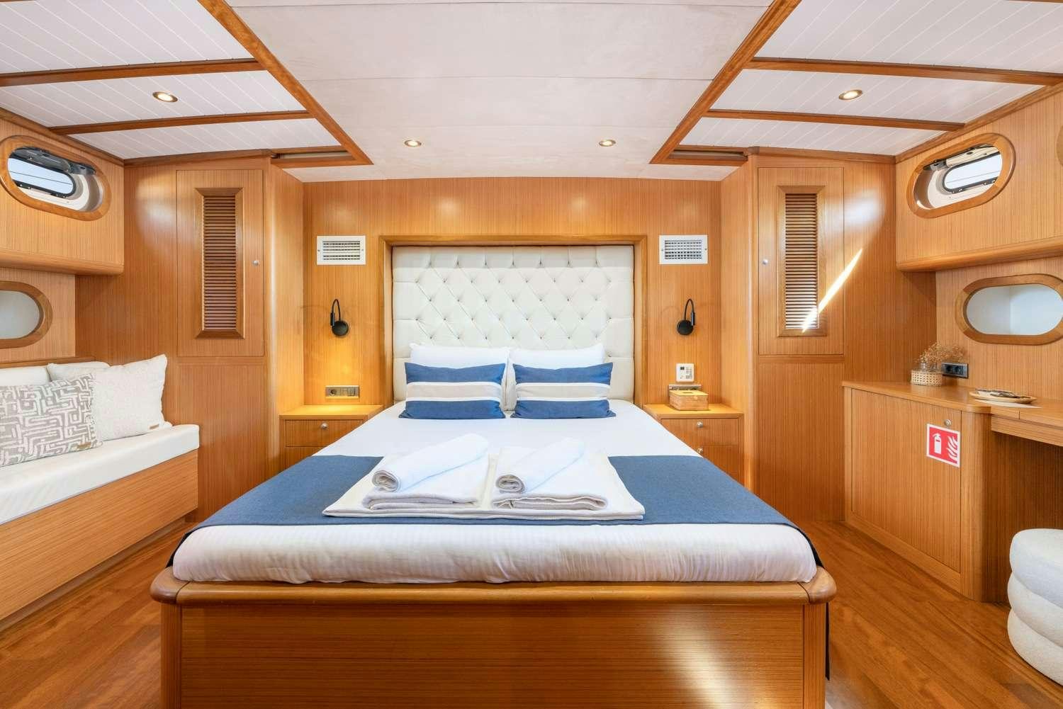 a room with two beds aboard GOZDEM THE ONE Yacht for Charter
