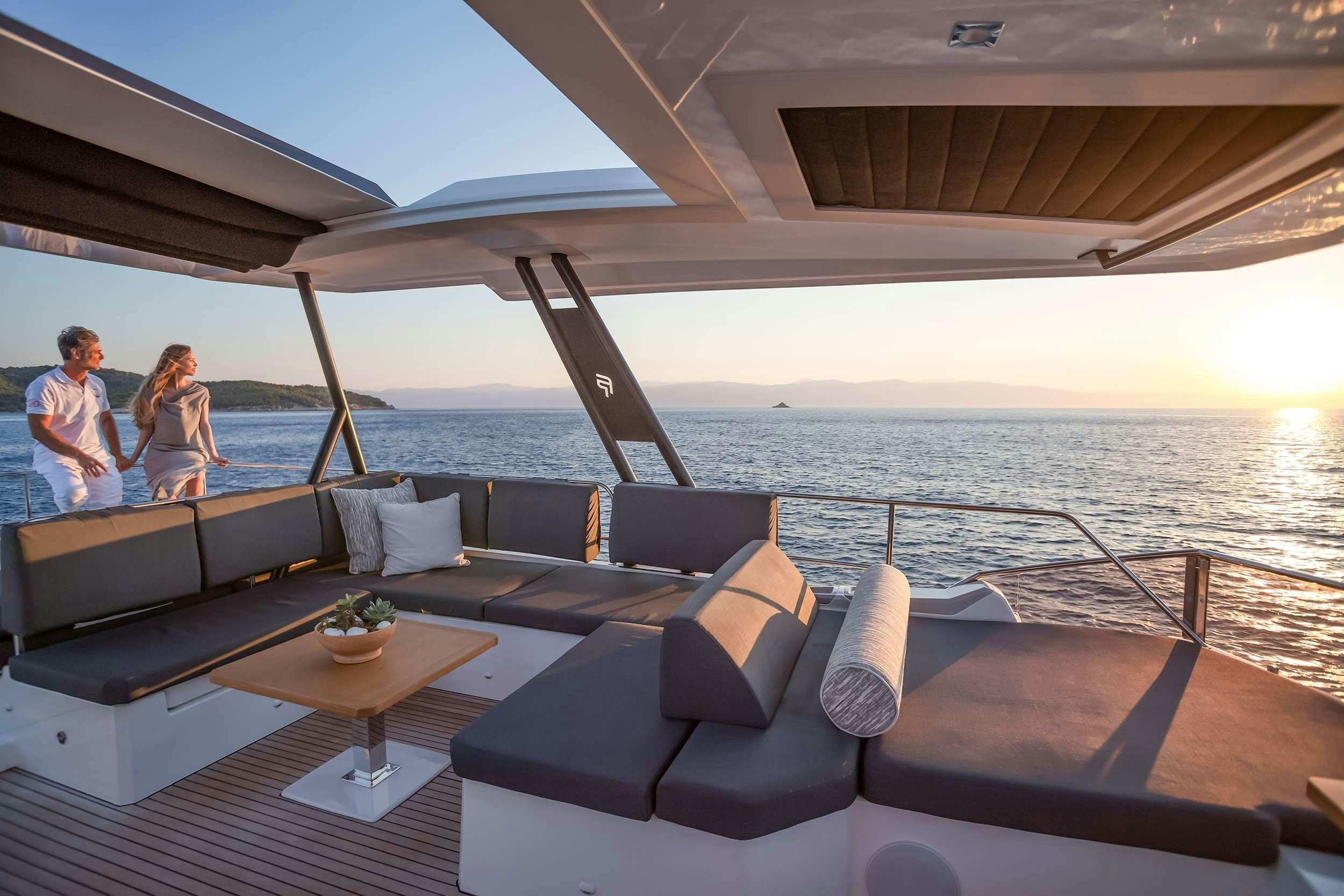 a couple sitting on a boat aboard D2 Yacht for Charter