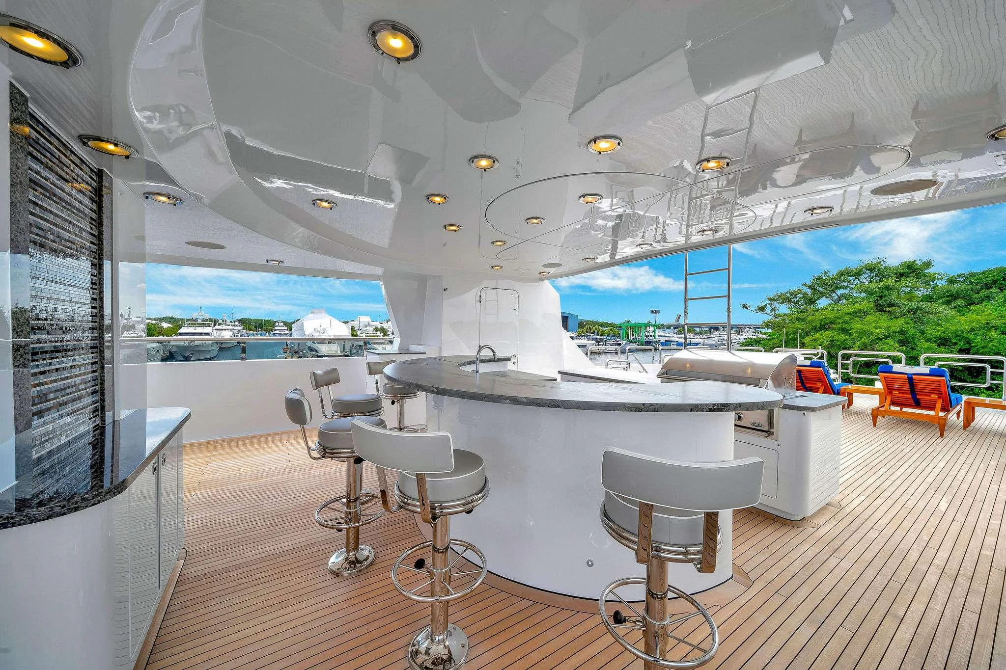 a room with tables and chairs aboard VALHALLA Yacht for Charter
