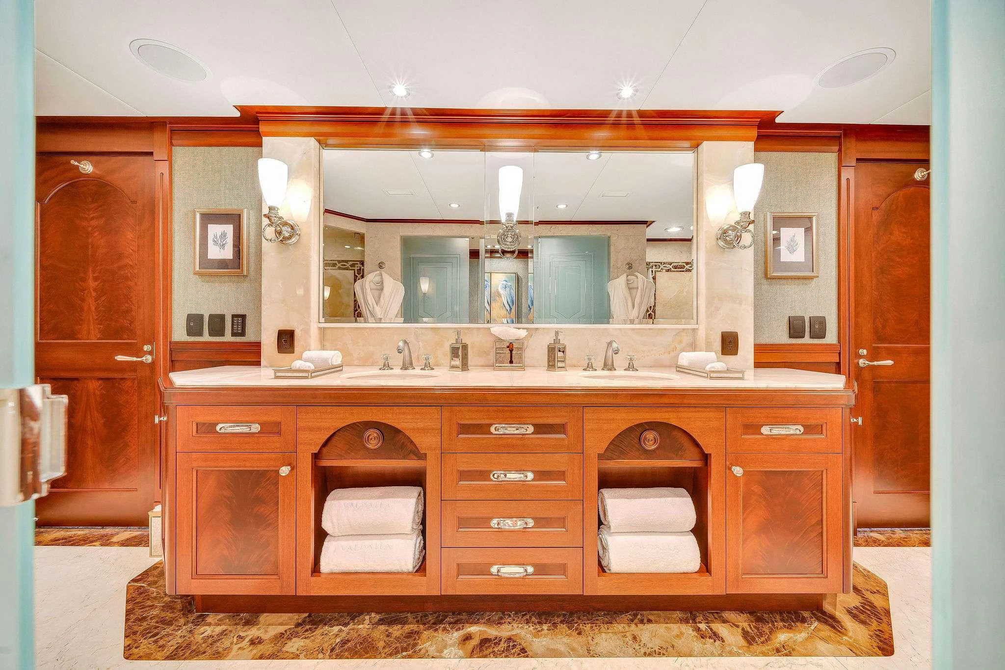 a bathroom with a large mirror aboard VALHALLA Yacht for Charter