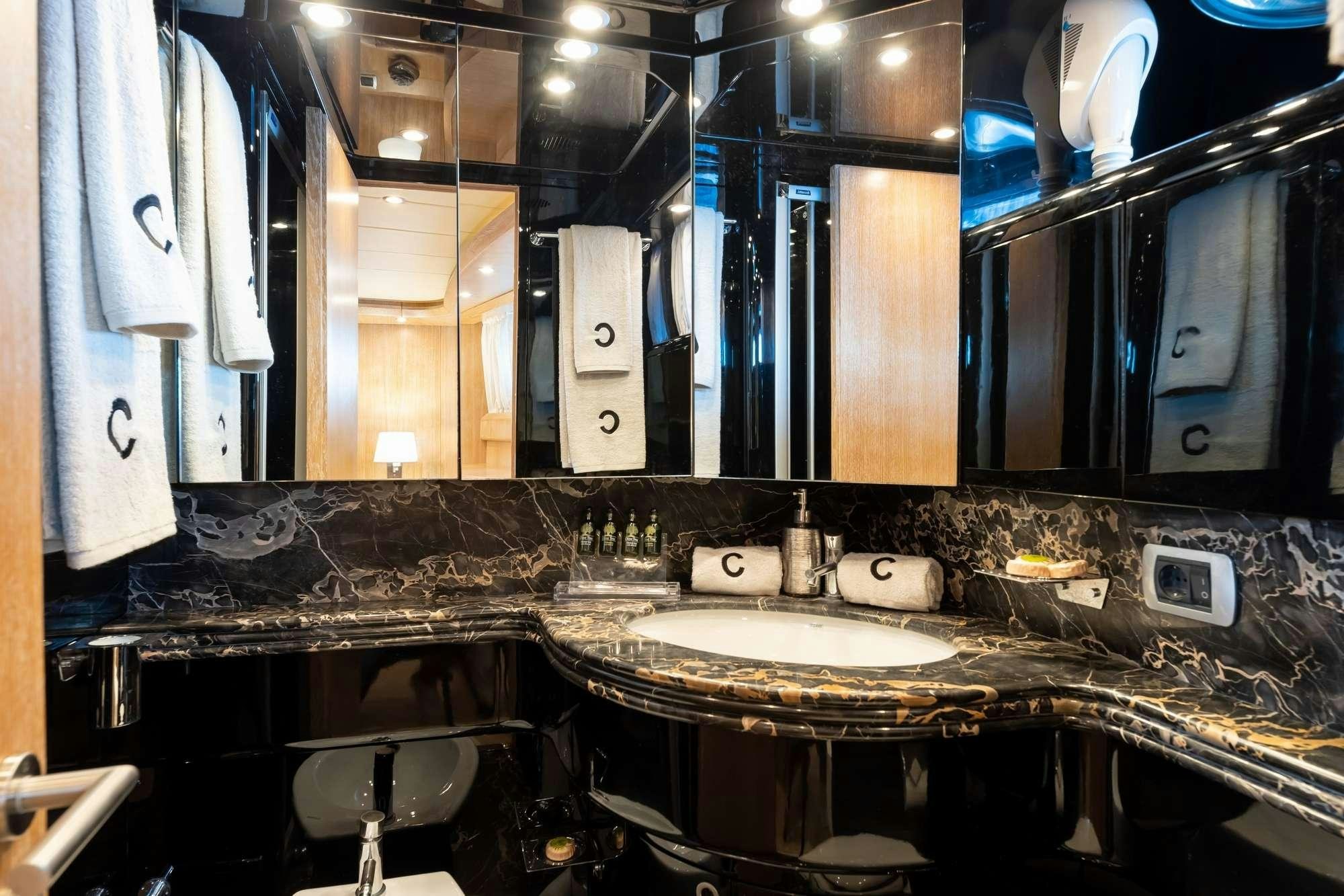 a bathroom with sinks and mirrors aboard COOKIE Yacht for Charter