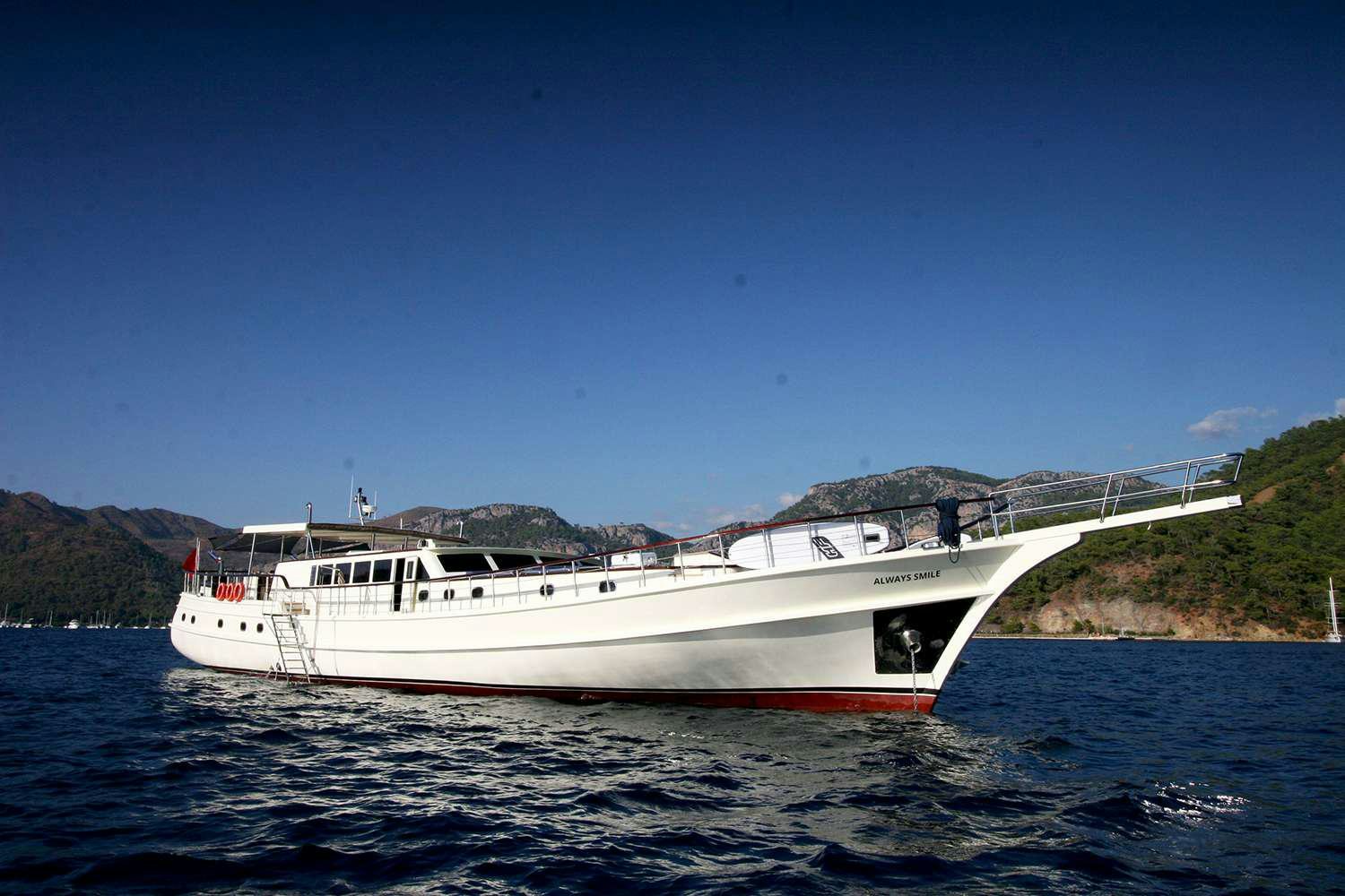 a boat on the water aboard ALWAYS SMILE Yacht for Charter