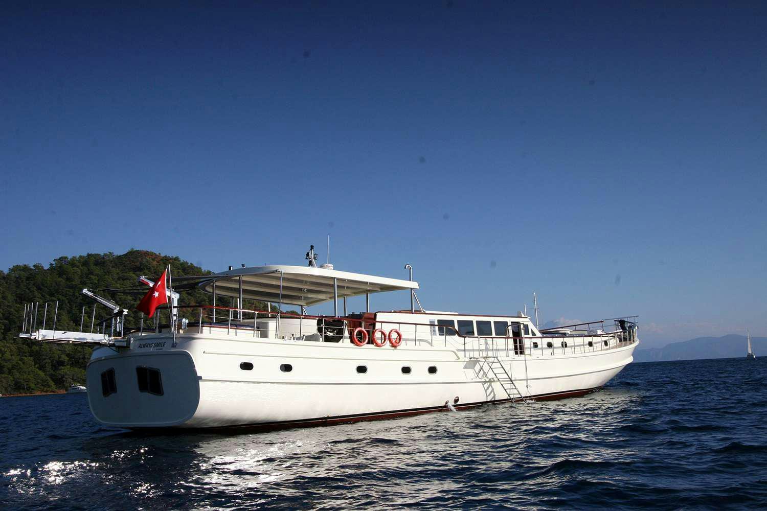 a boat on the water aboard ALWAYS SMILE Yacht for Charter