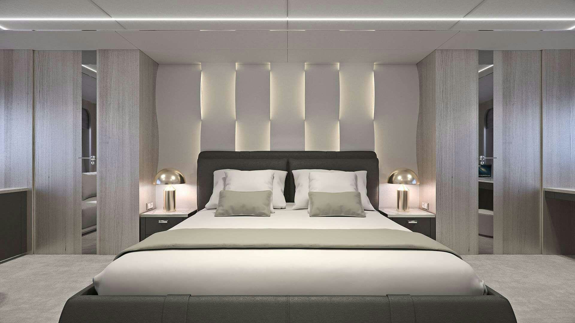 a large white bed with a white bed spread aboard ADRI Yacht for Charter