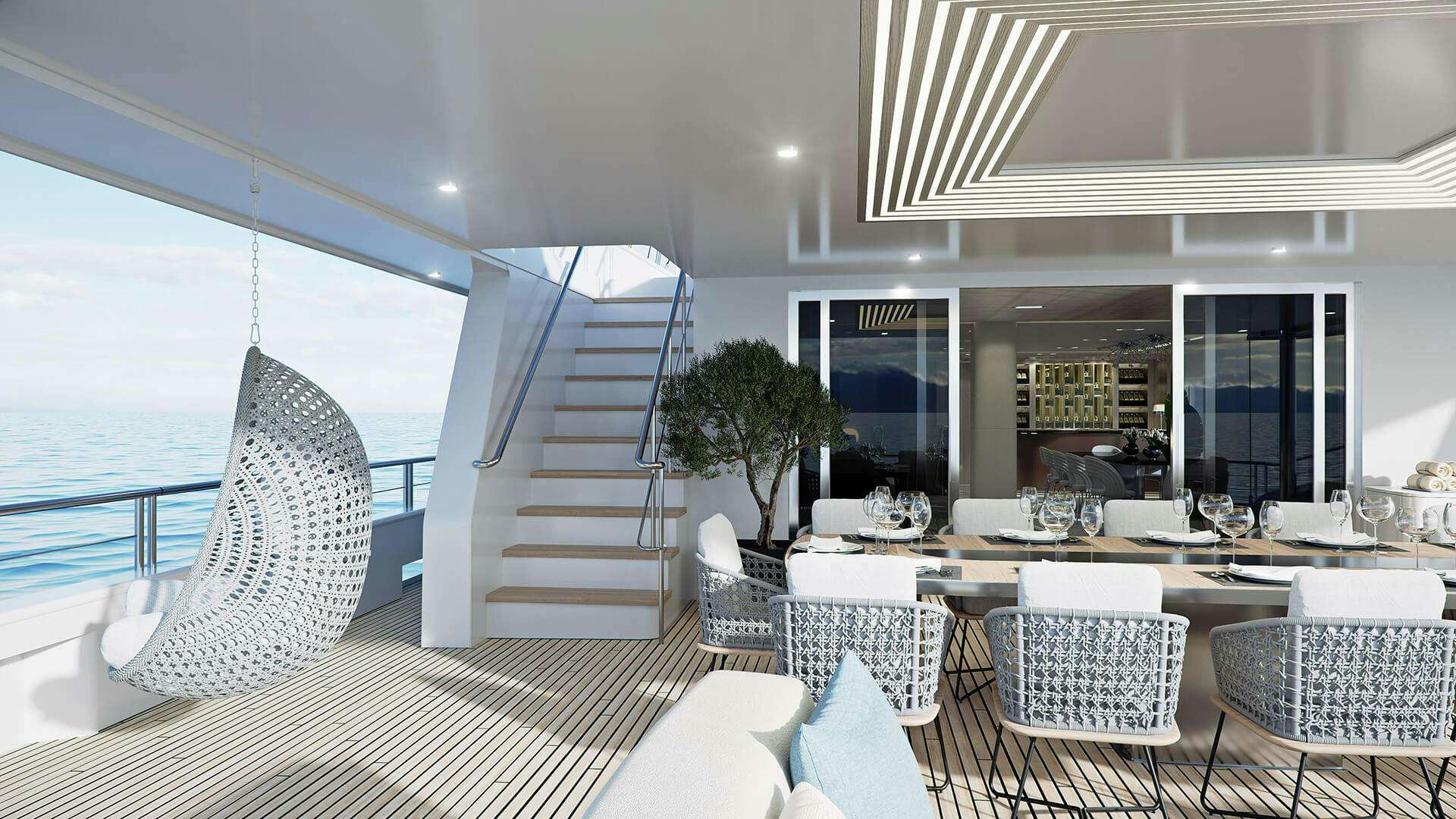 a large room with tables and chairs aboard ADRI Yacht for Charter