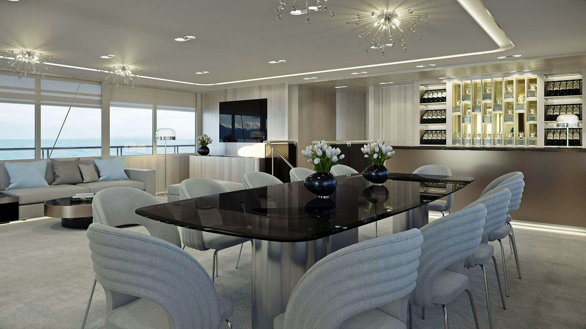 a large room with a table and chairs aboard ADRI Yacht for Charter