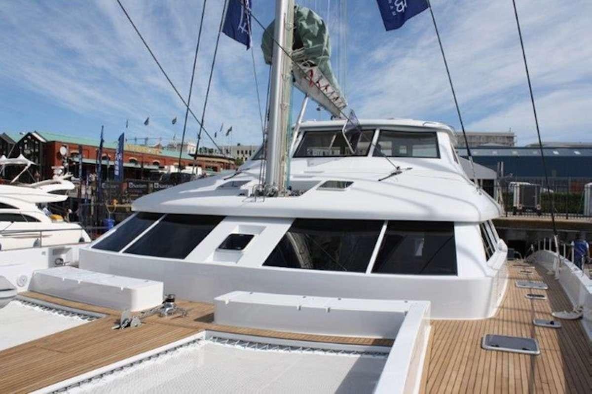 a boat on a deck aboard HQ2 Yacht for Charter