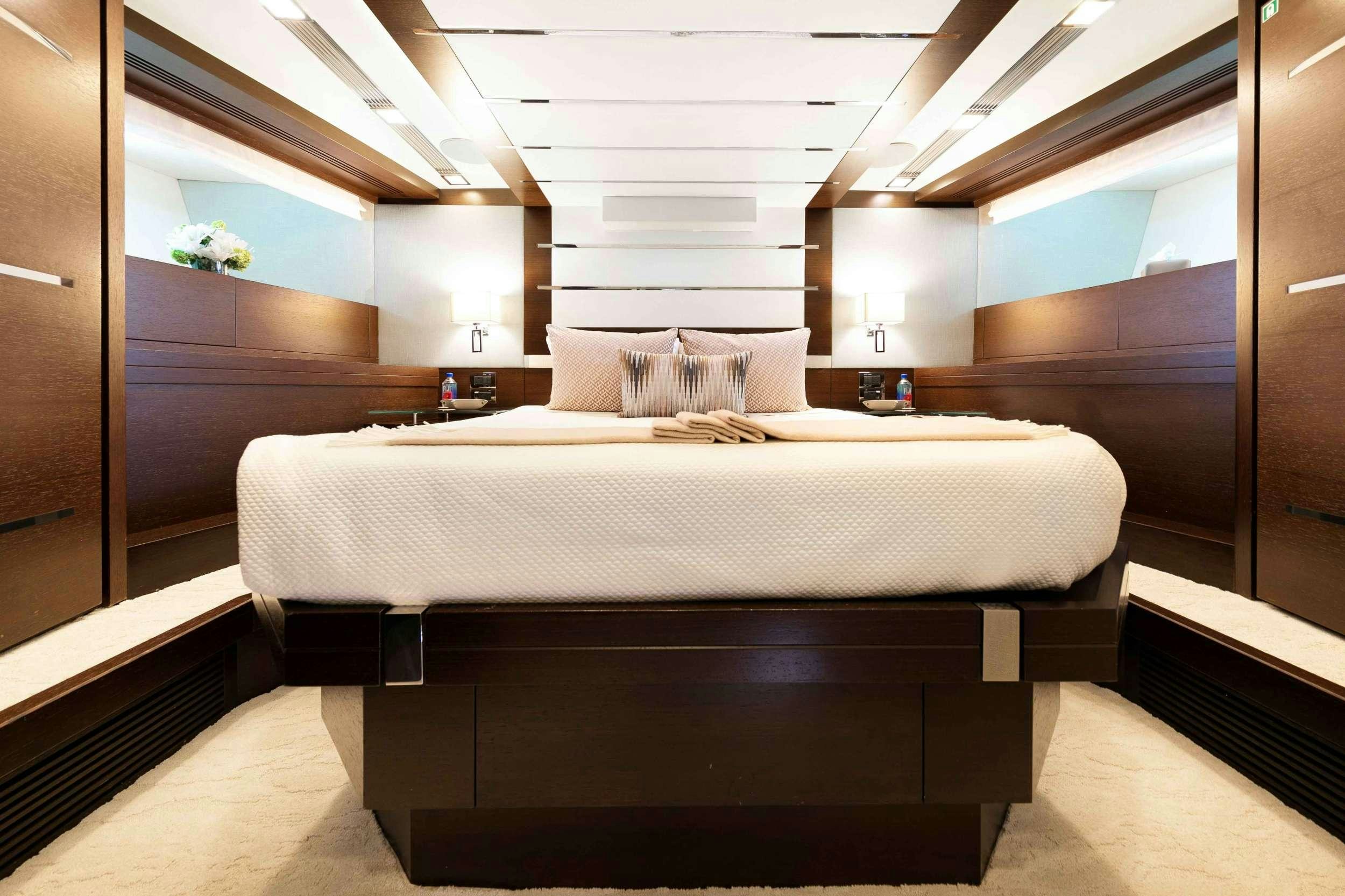 a bed in a room aboard CAMY ED Yacht for Charter