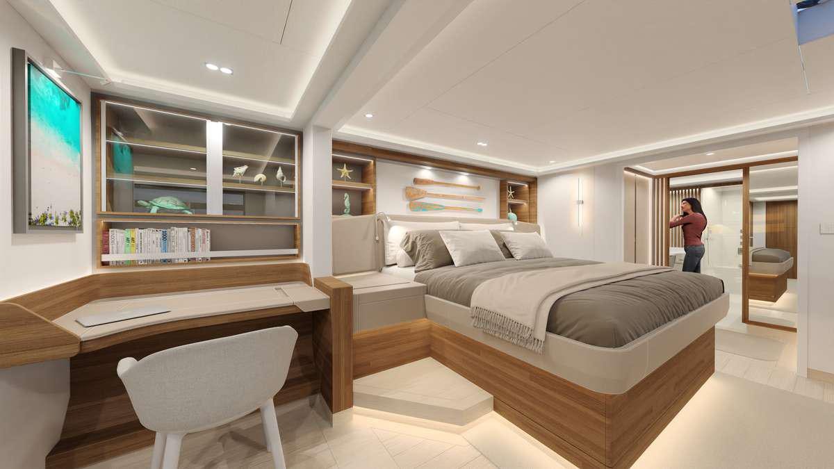 a room with a bed and a desk aboard SERENISSIMA III Yacht for Charter