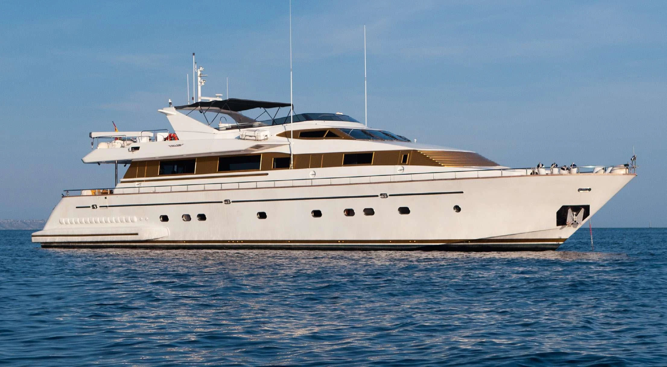 a large white yacht aboard BLUE GOLD Yacht for Charter